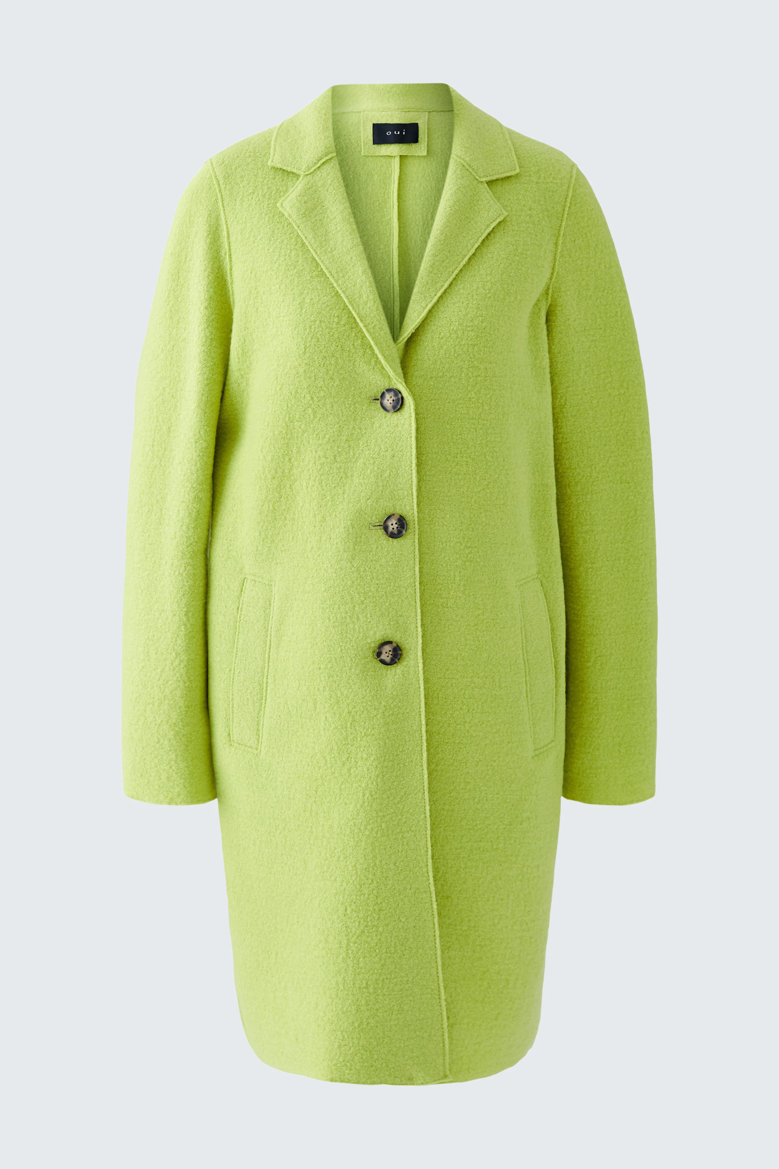 Eleganter Wollmantel in leuchtendem Grün mit Knöpfen und Taschen, ideal für stilvolle Auftritte.