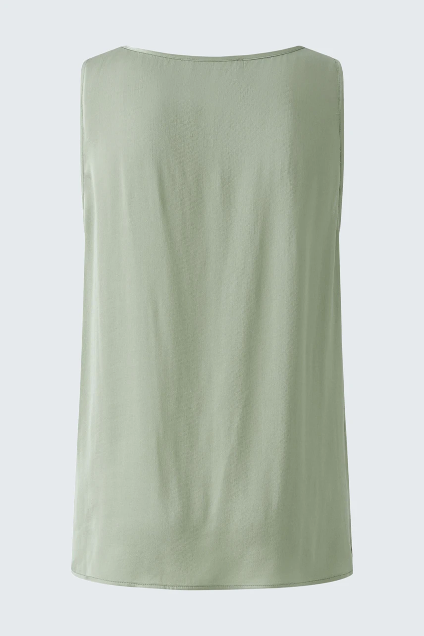 Elegantes Damen-Top in sanftem Grün, ideal für lässige und schicke Anlässe.