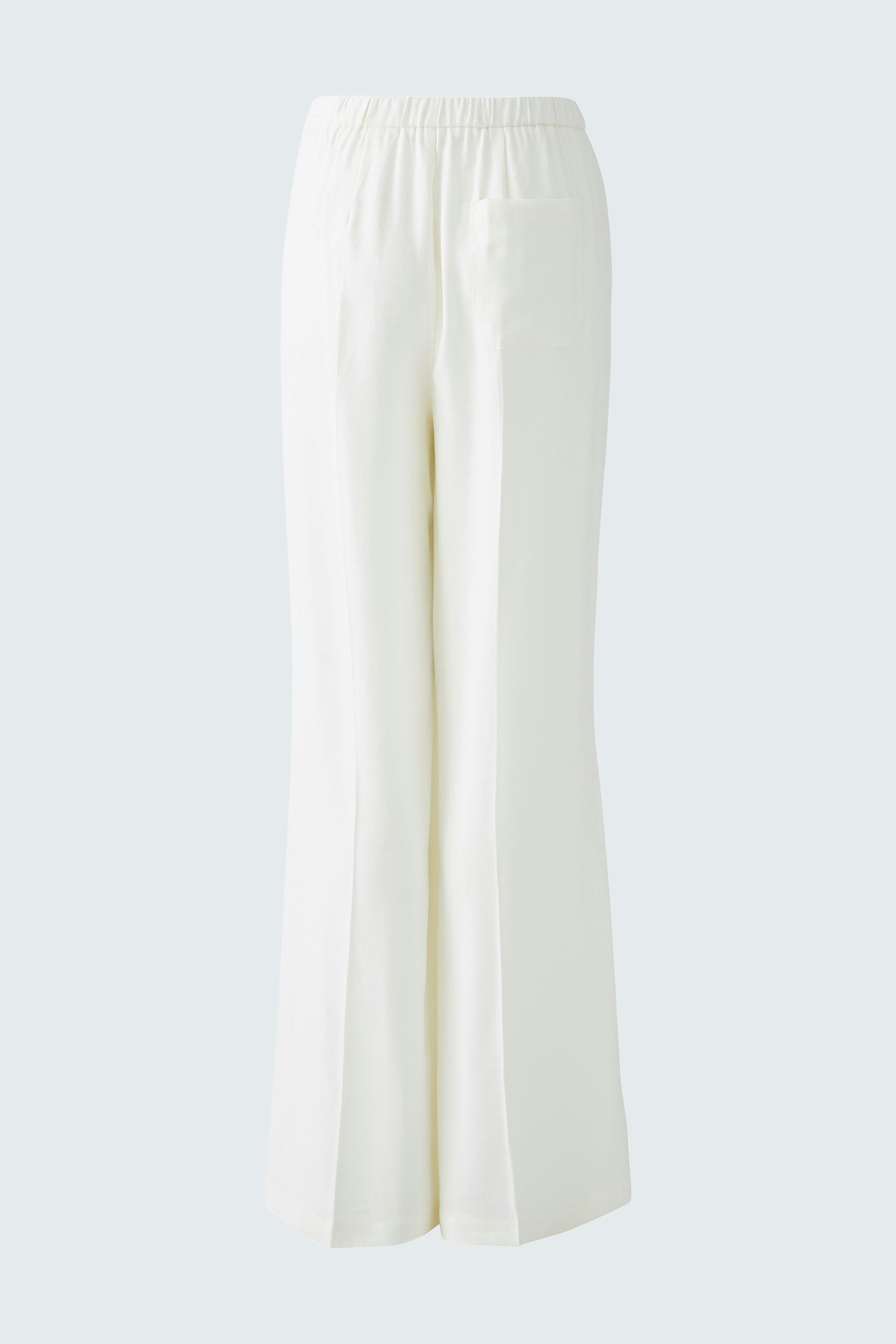 Elegant women's trousers in soft white fabric with a relaxed fit and wide legs.