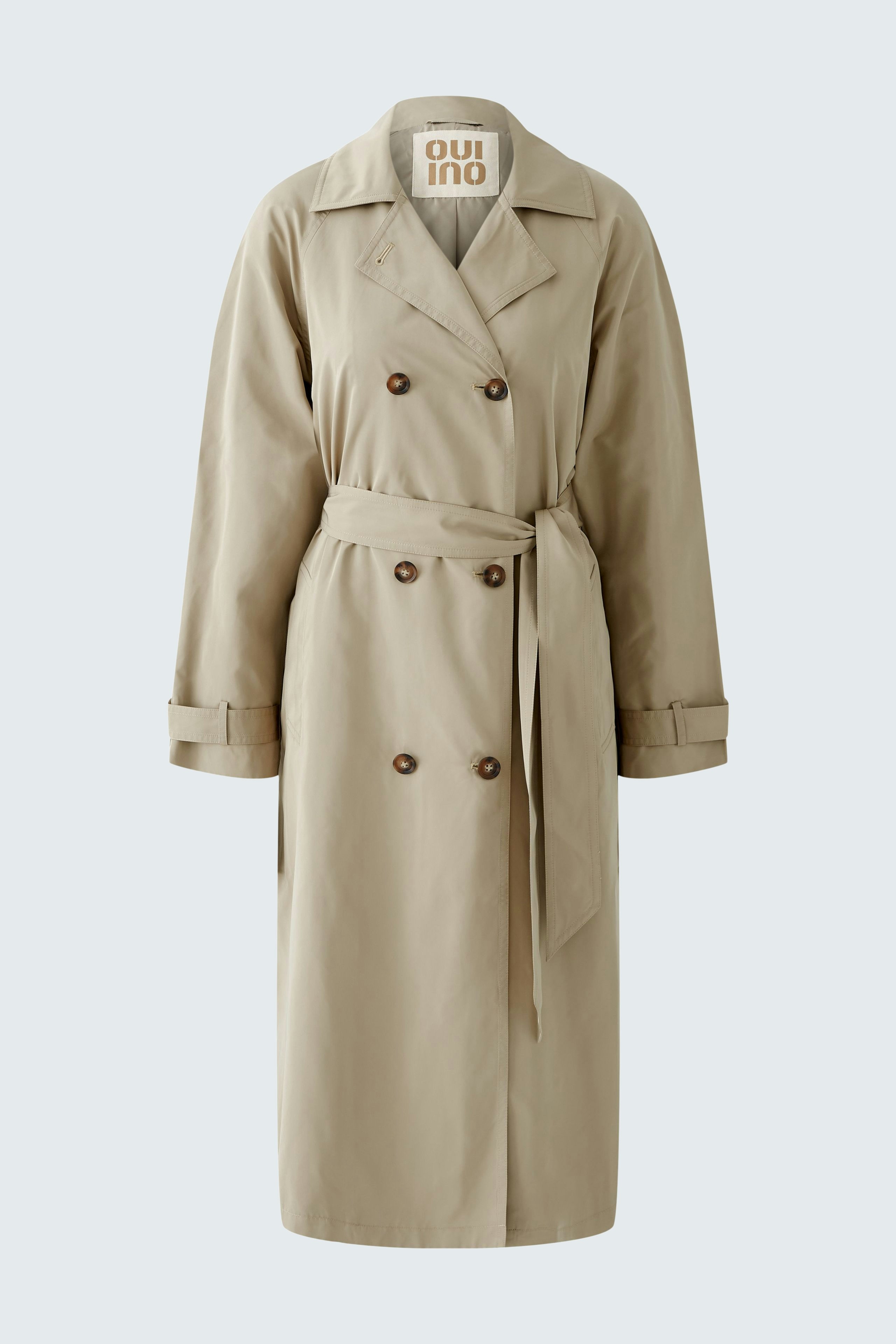 Stylish women's trench coat in beige with double-breasted buttons and a belted waist.