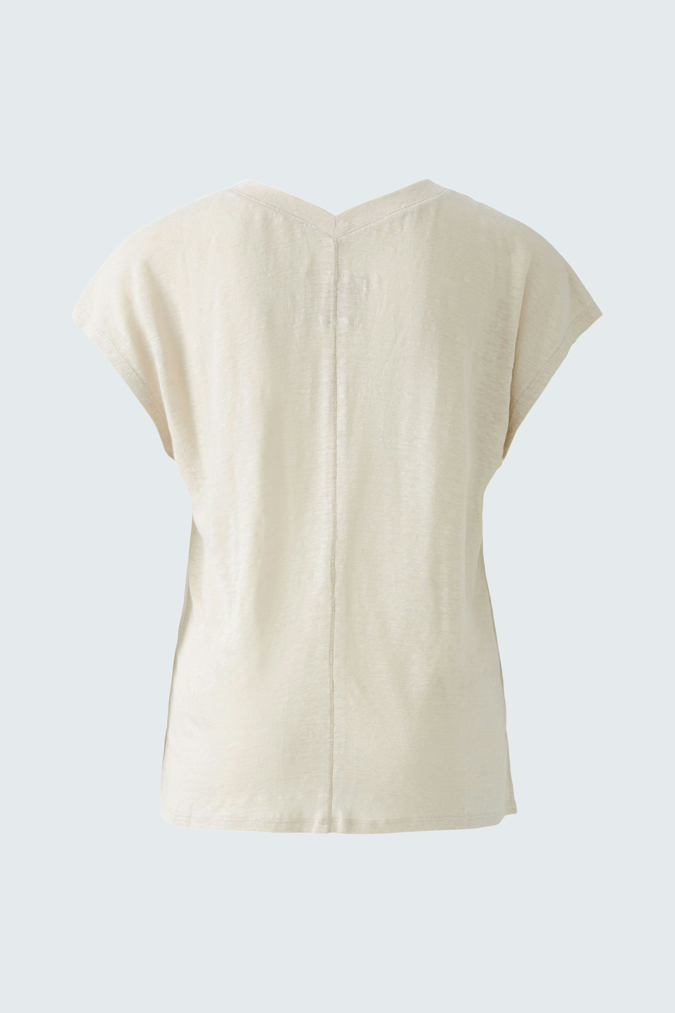 Stylish women's T-shirt in soft cream color with a relaxed fit and unique back design.