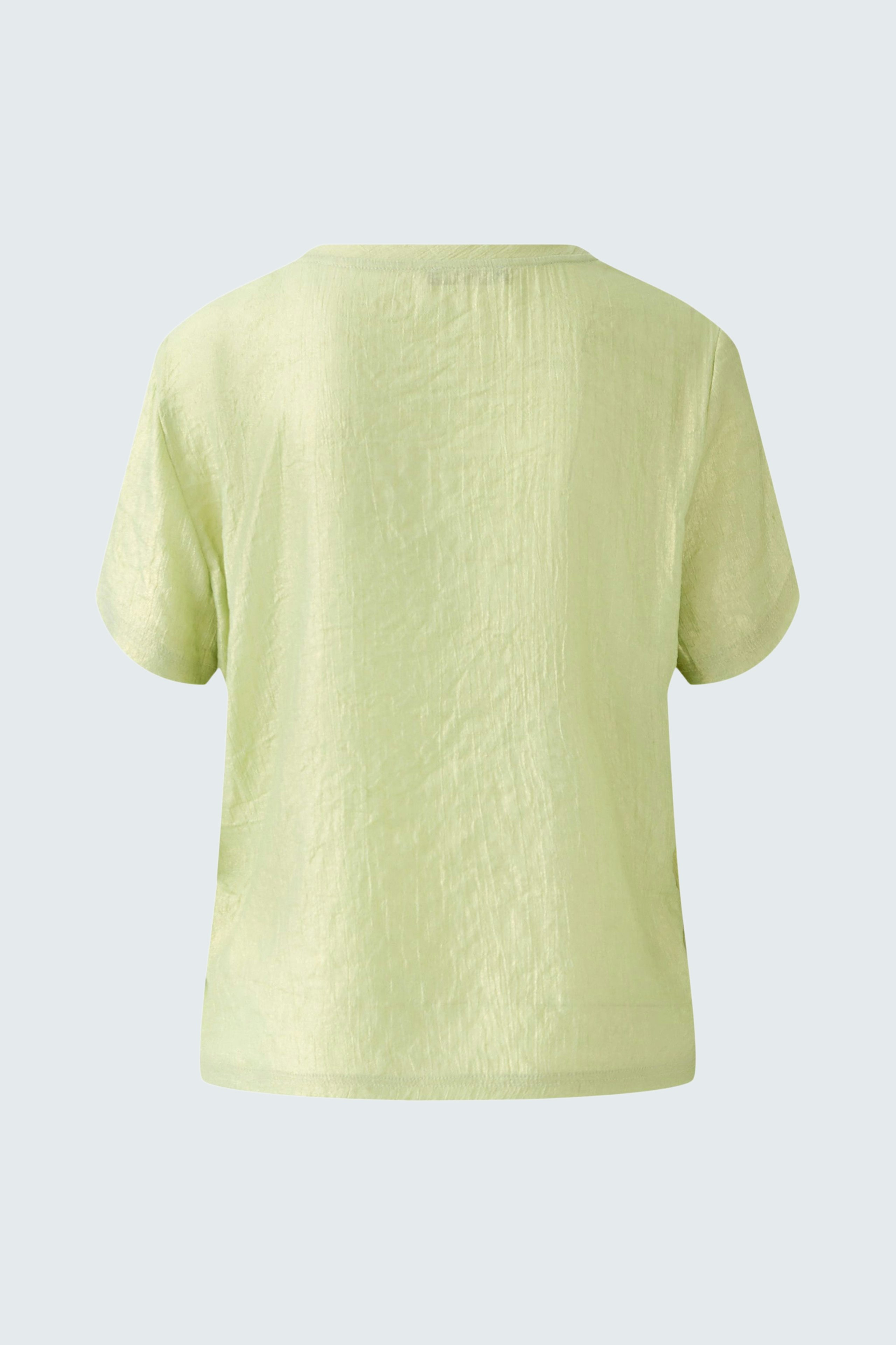 Light green blouse with a relaxed fit, perfect for casual or dressy occasions.