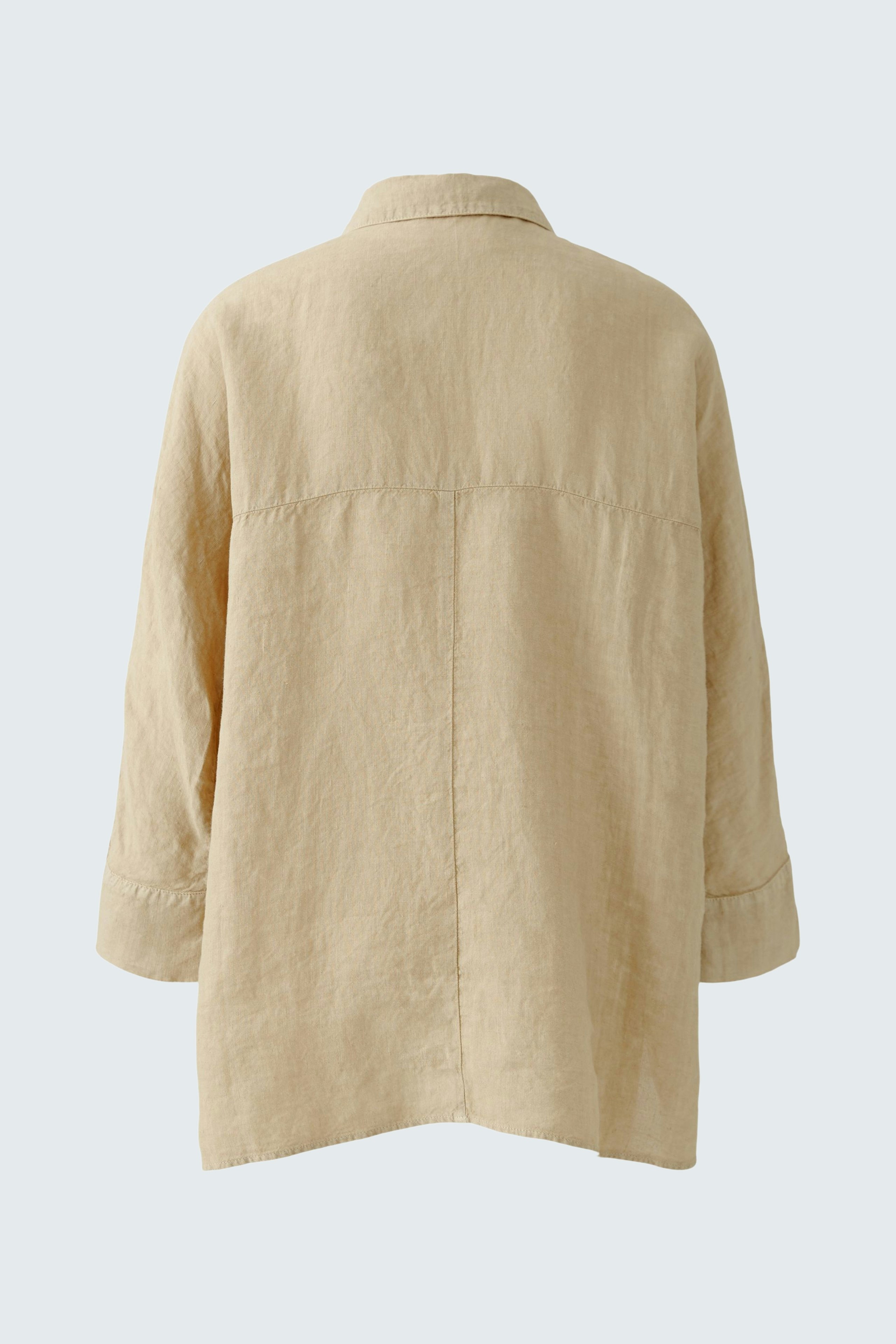 Bequeme Damen-Bluse in hellem Beige mit lässigem Schnitt und umschlagenem Kragen.