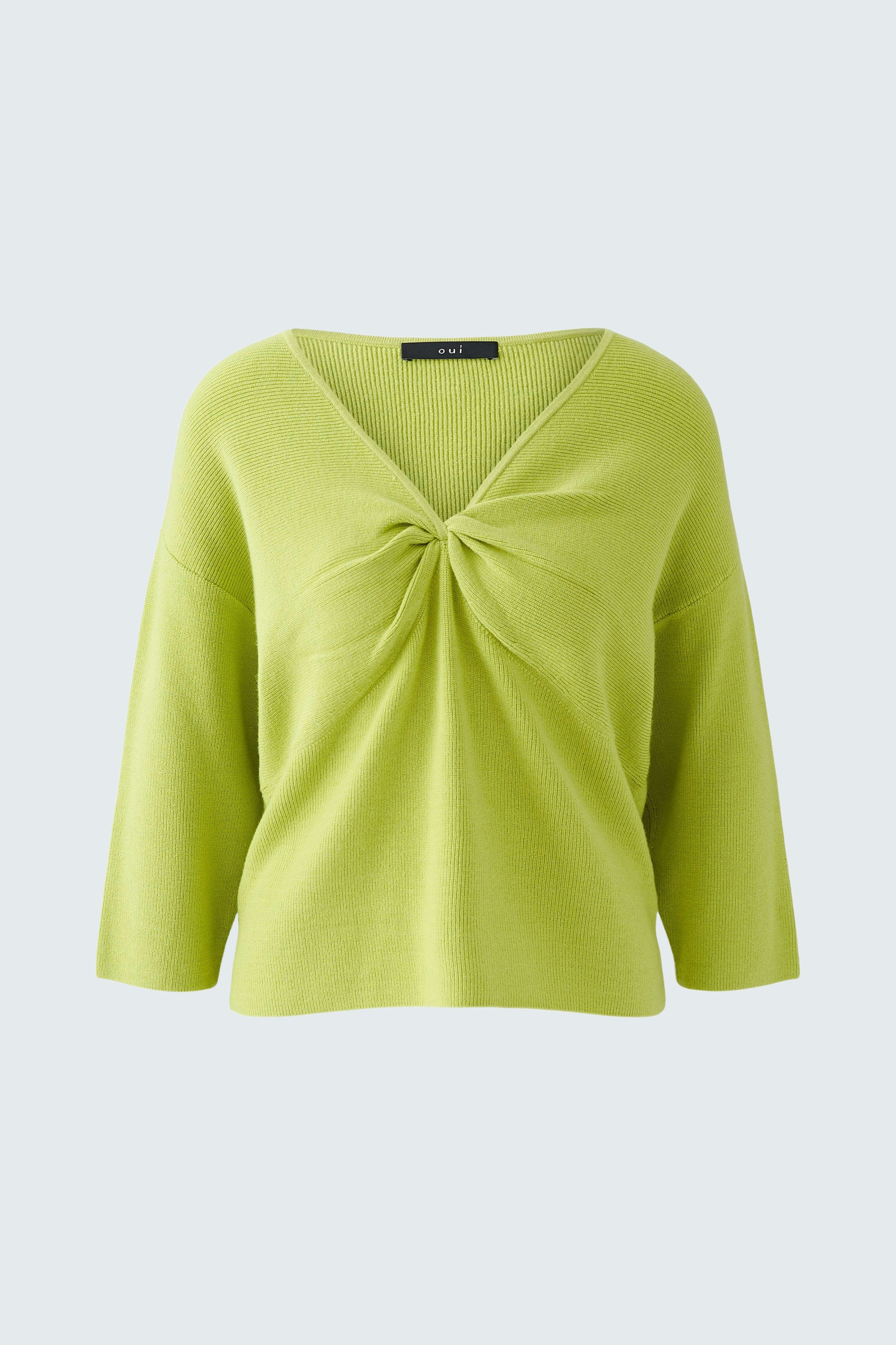 Frischer Damen-Pullover in leuchtendem Grün mit V-Ausschnitt und lässigem Schnitt.