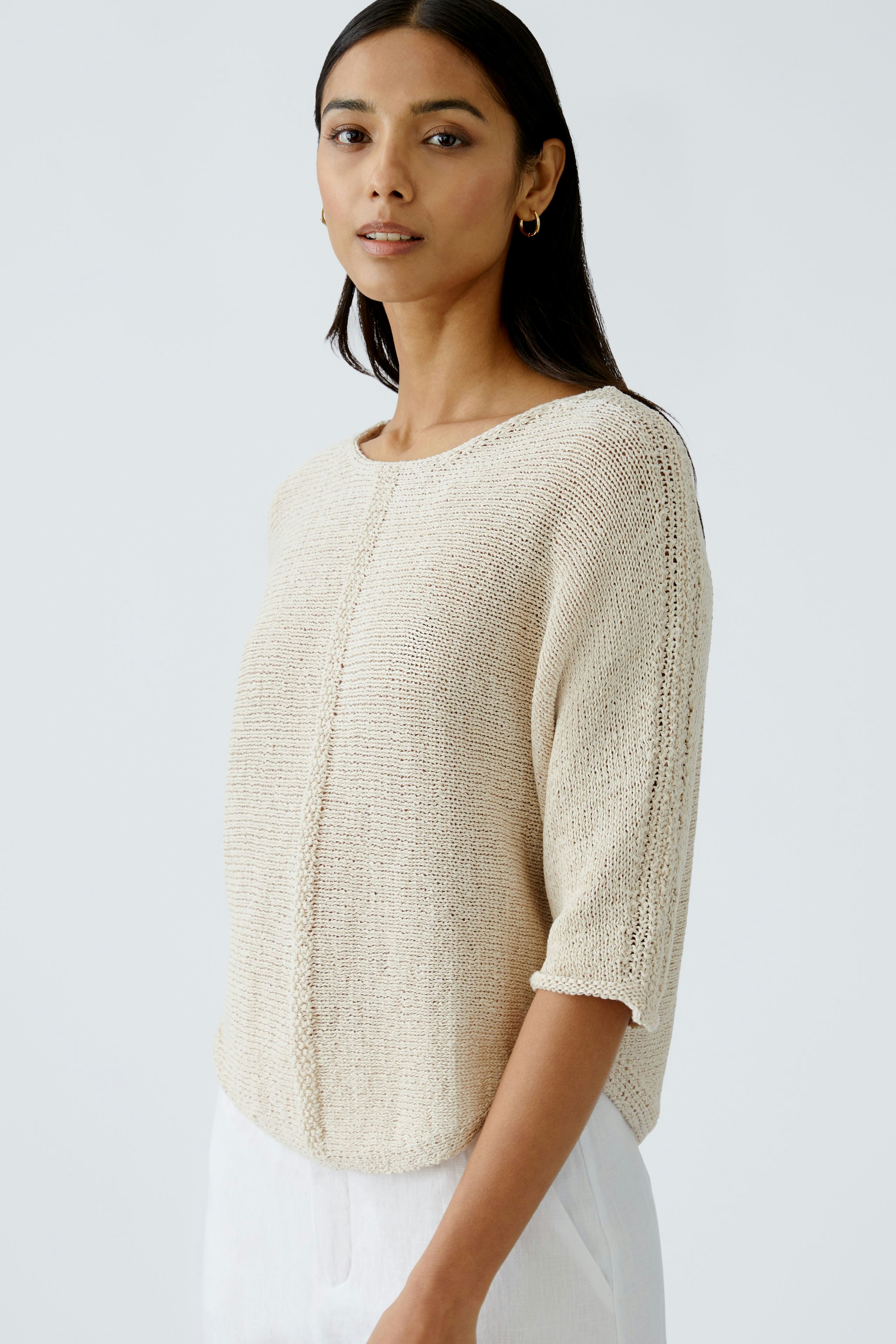 Eleganter Damen-Pullover in hellem Beige, lässig geschnitten, ideal für den Alltag.