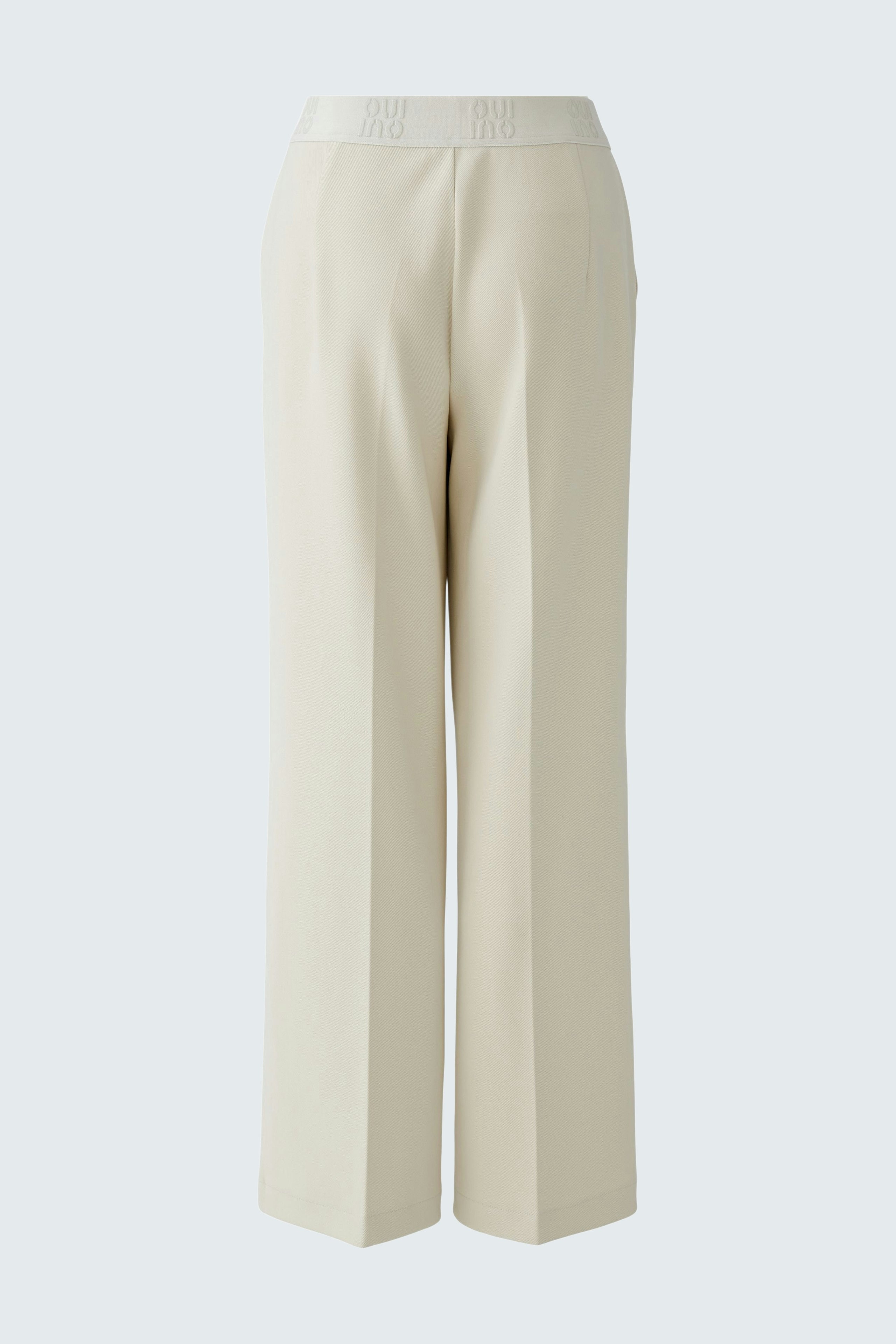 Casual women's trousers: Cream wide-leg pants with a comfortable waistband, perfect for everyday wear.