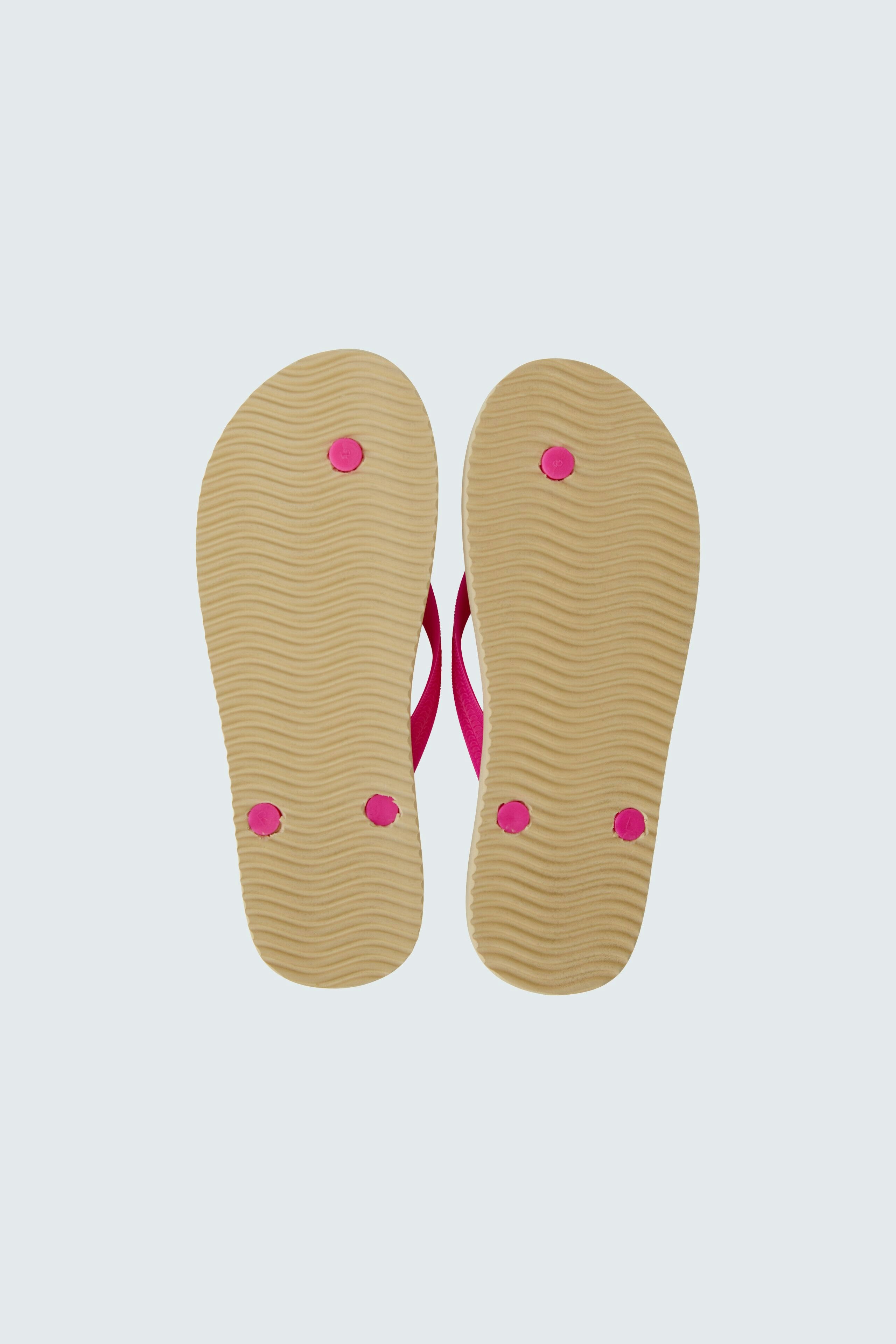 Bequeme Flip Flops für Damen in leuchtendem Pink mit rutschfester Sohle für optimalen Halt.