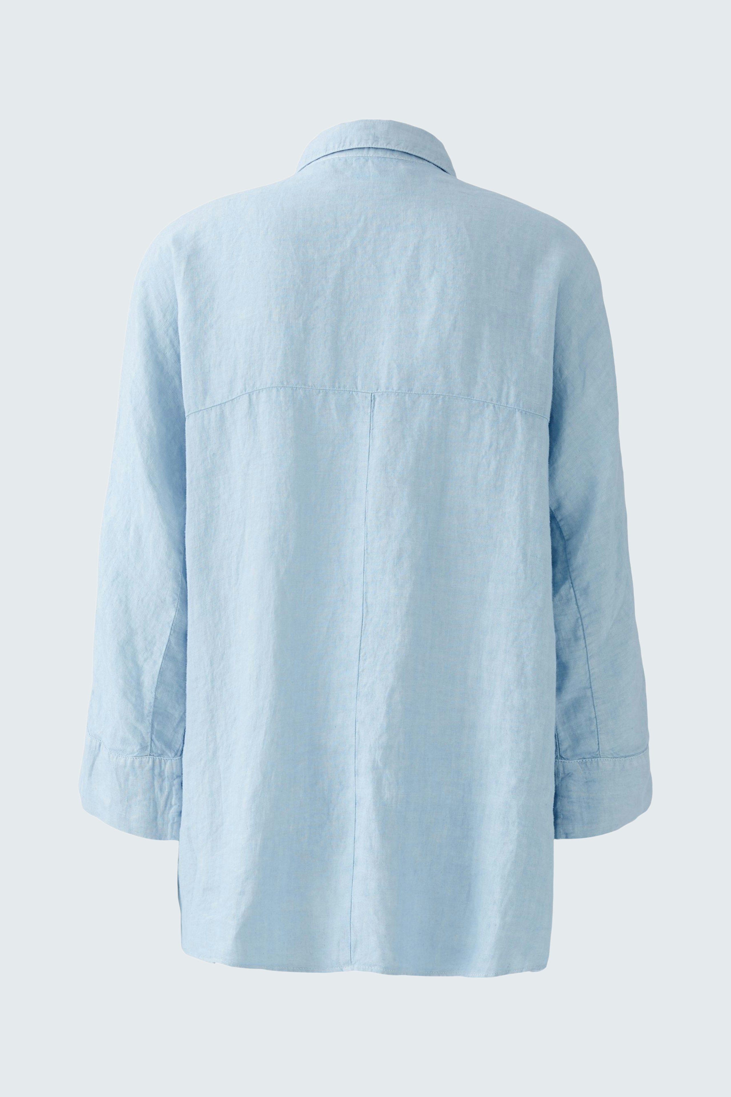 Light blue blouse with a relaxed fit and three-quarter sleeves, perfect for casual wear.