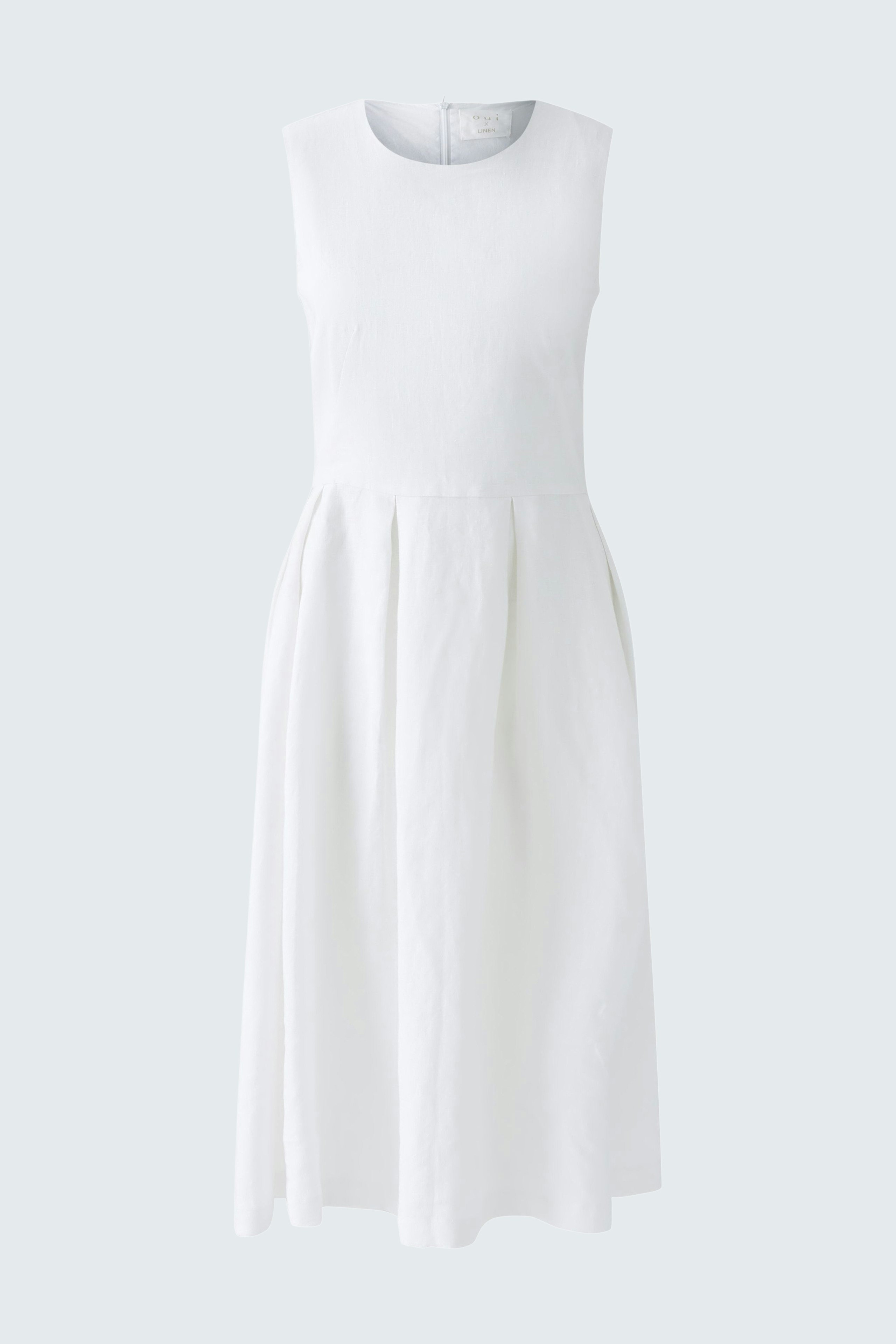 Casual white midi dress with a fitted bodice and flowing skirt, perfect for warm days.