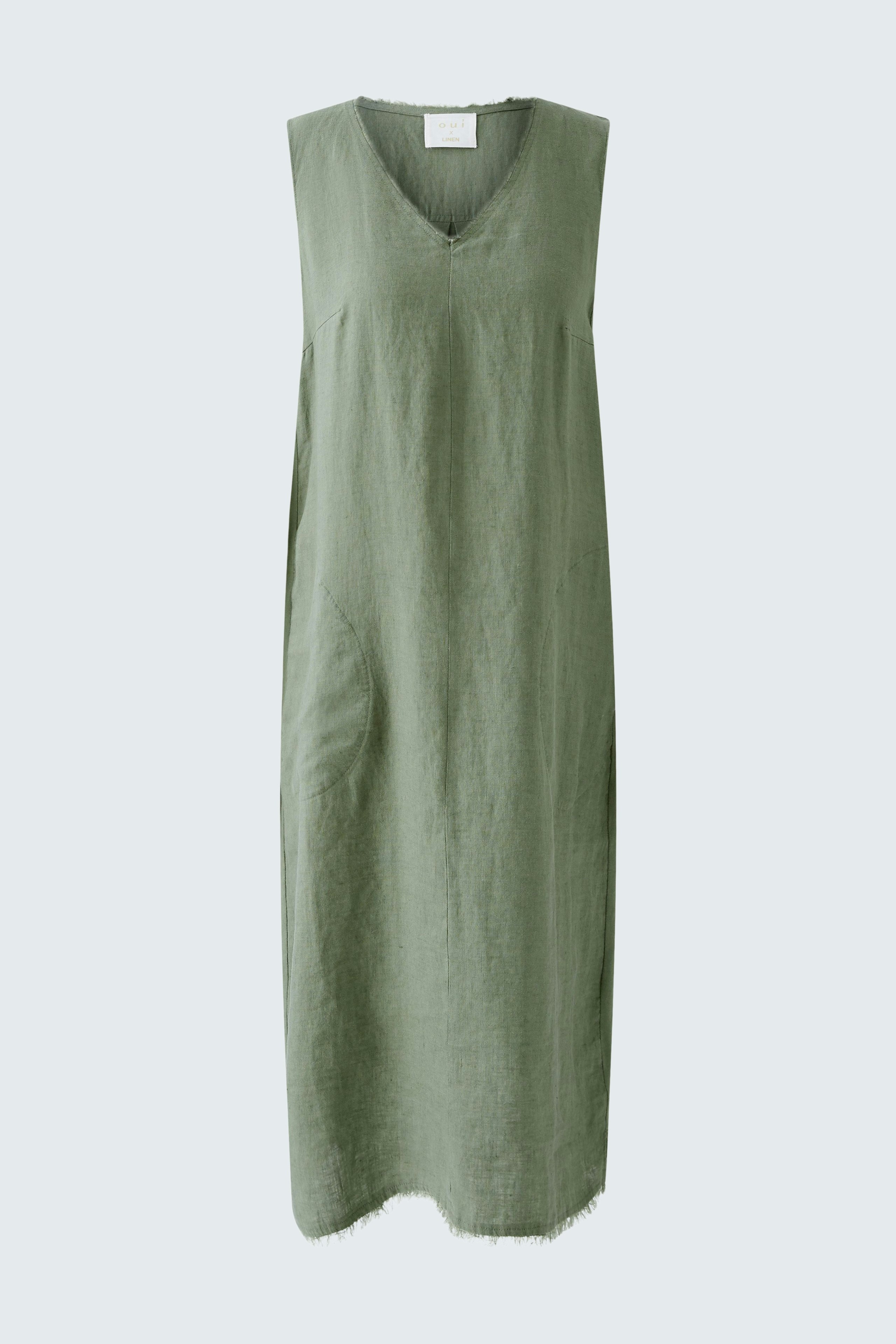 Elegant A-line dress in soft green, perfect for warm days and casual outings.
