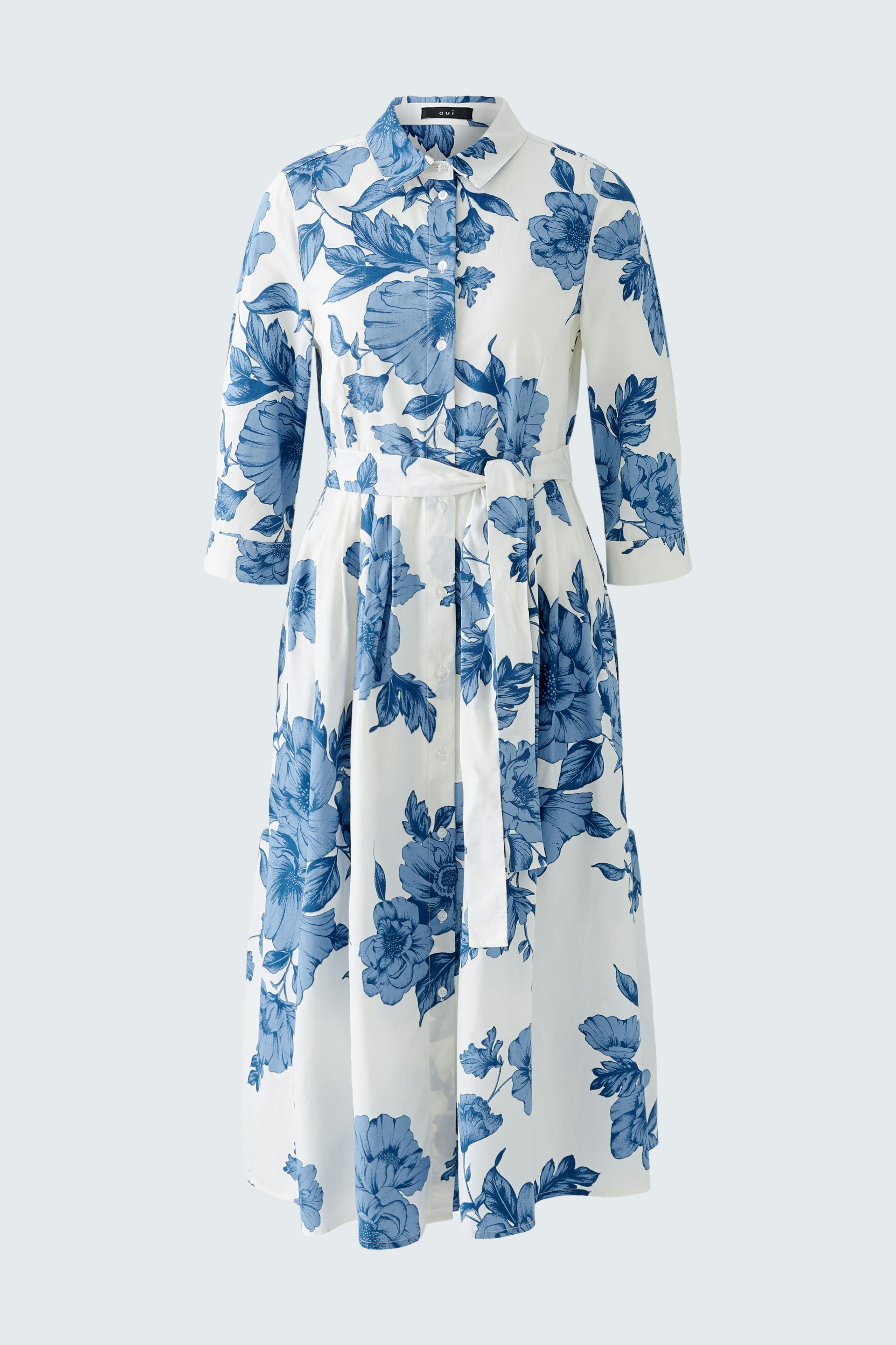 Floral midi dress: Elegant women's dress with blue floral pattern and belted waist.
