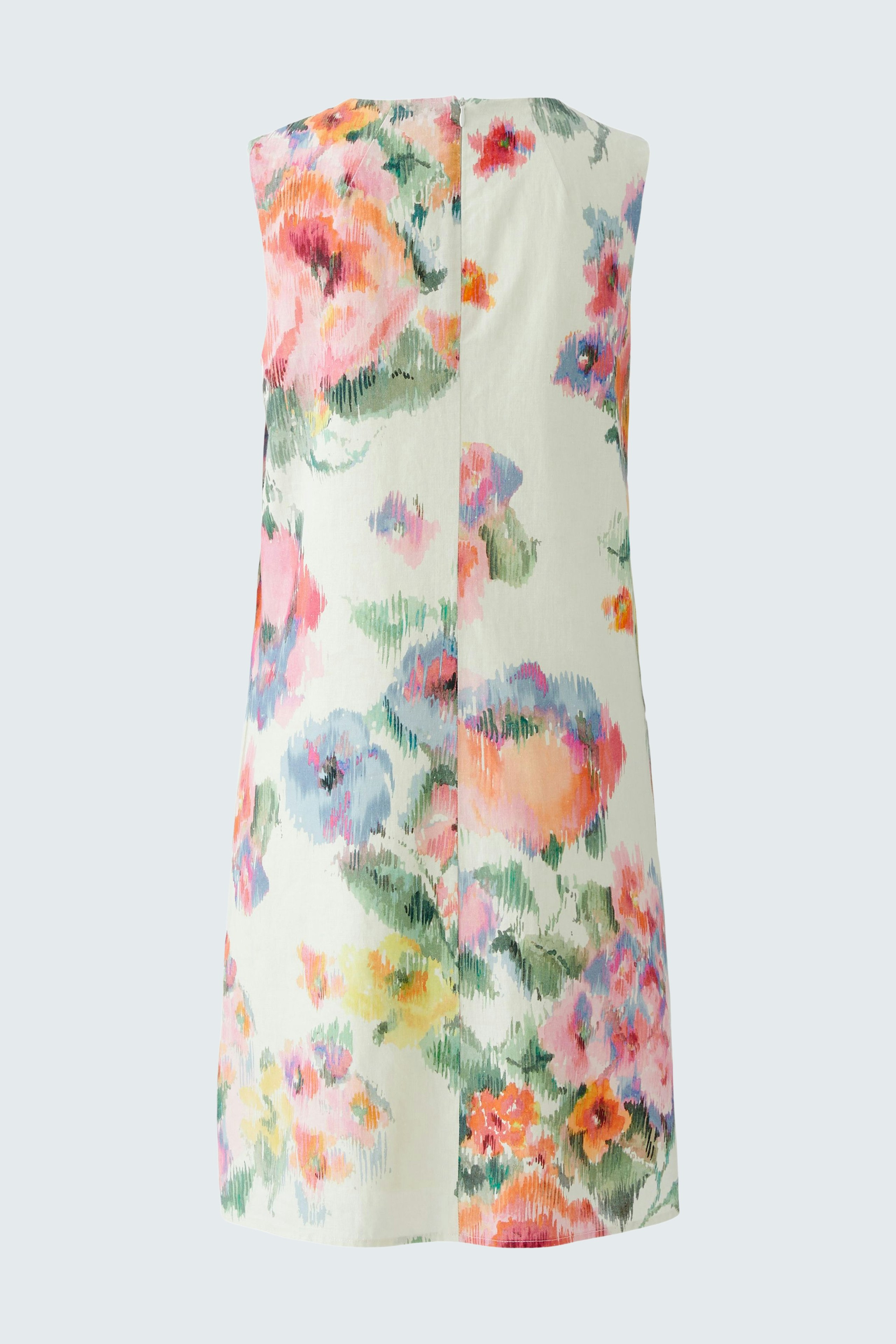 Floral A-line dress: A woman in a vibrant floral A-line dress, perfect for summer occasions.