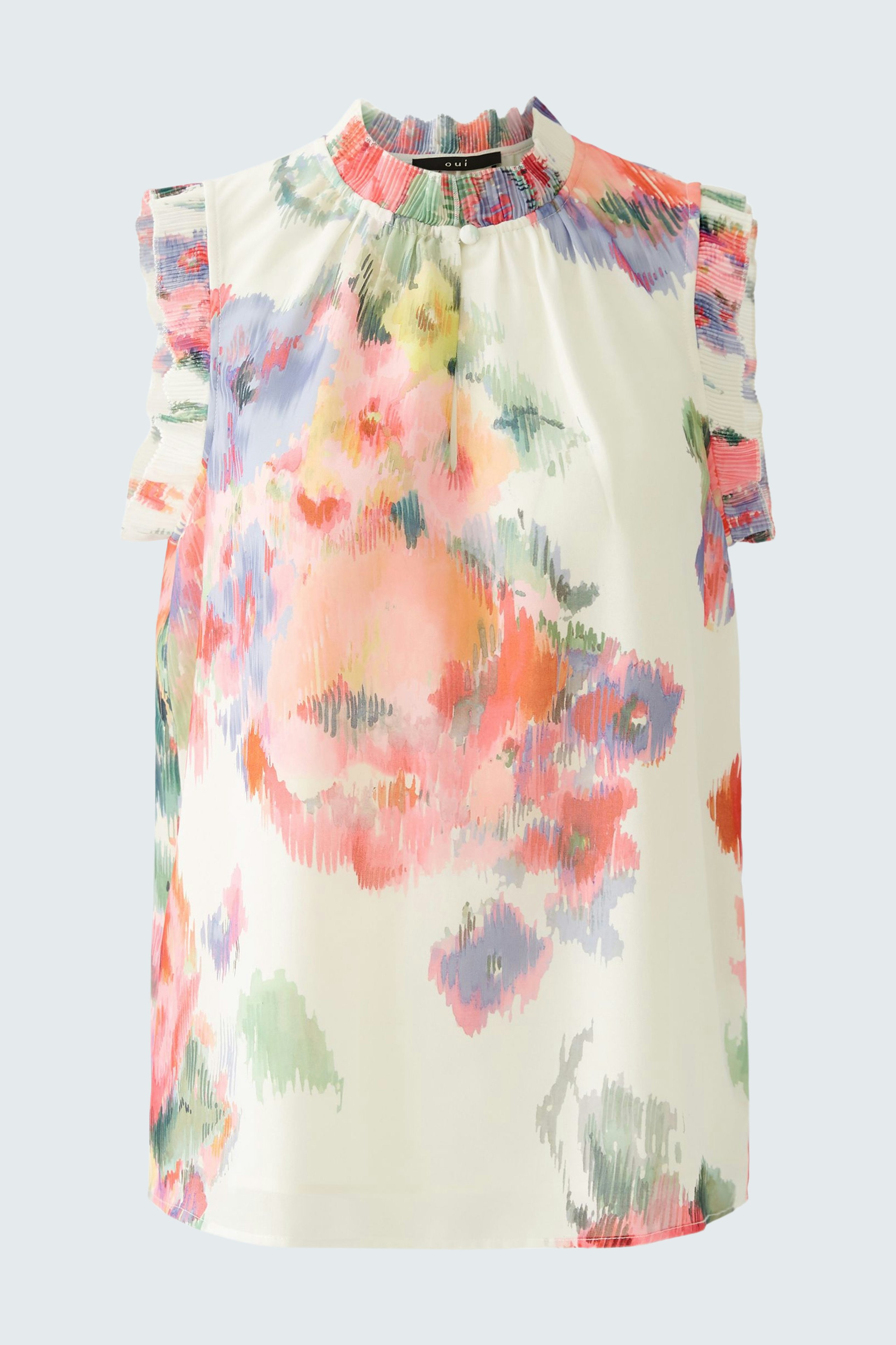 Feminine Bluse mit floralem Muster und Rüschendetails, ideal für einen frischen, eleganten Look.