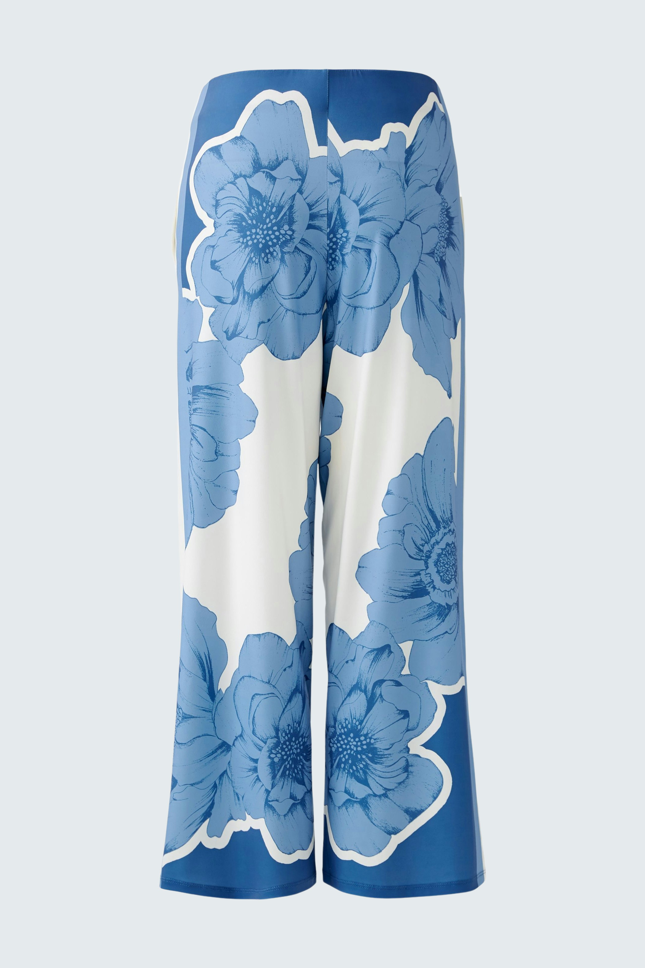 Stylish women's trousers with a blue floral pattern, perfect for a chic summer look.