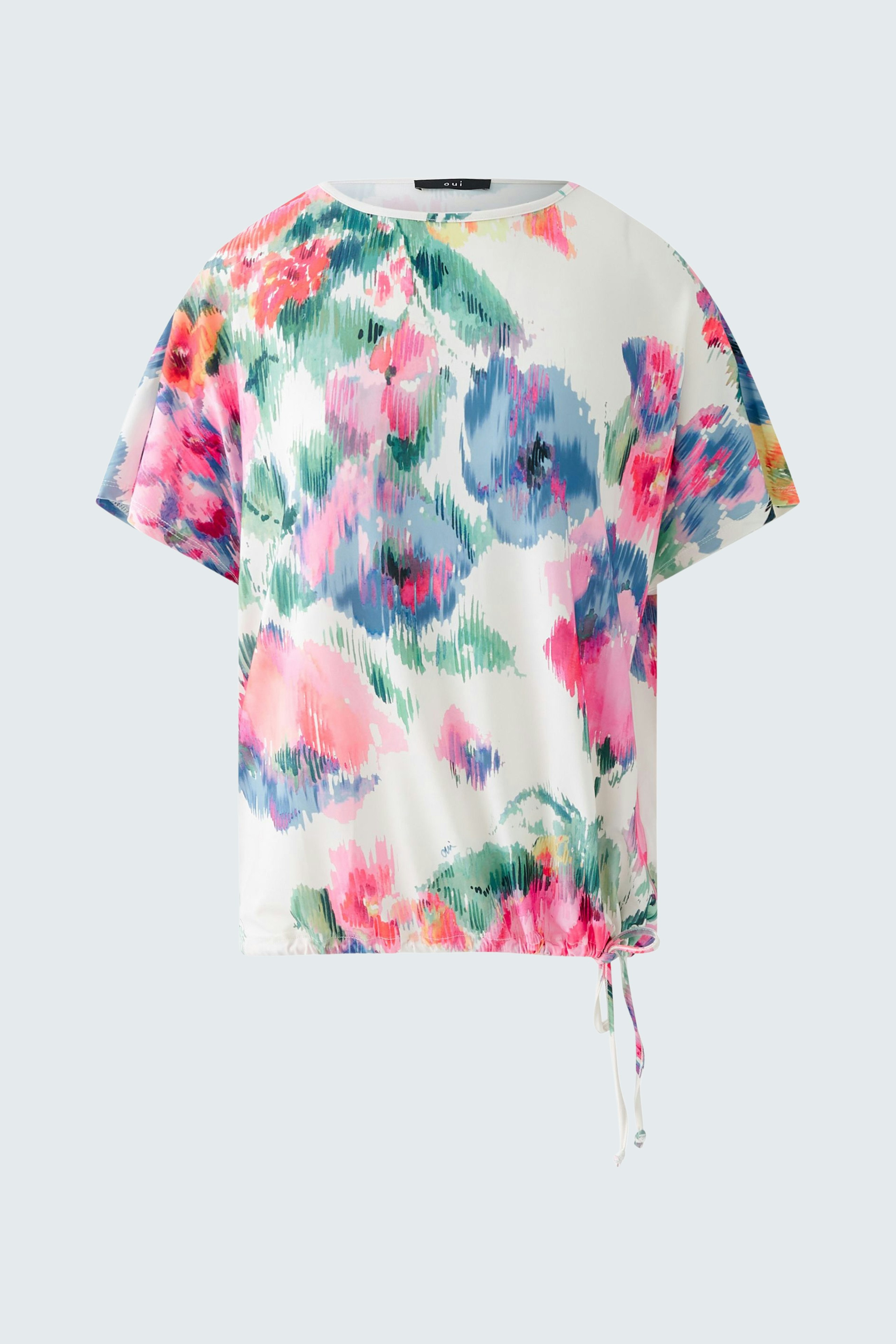 Buntes Damen-T-Shirt mit floralem Muster und seitlichem Bindeband, ideal für lässige Outfits.