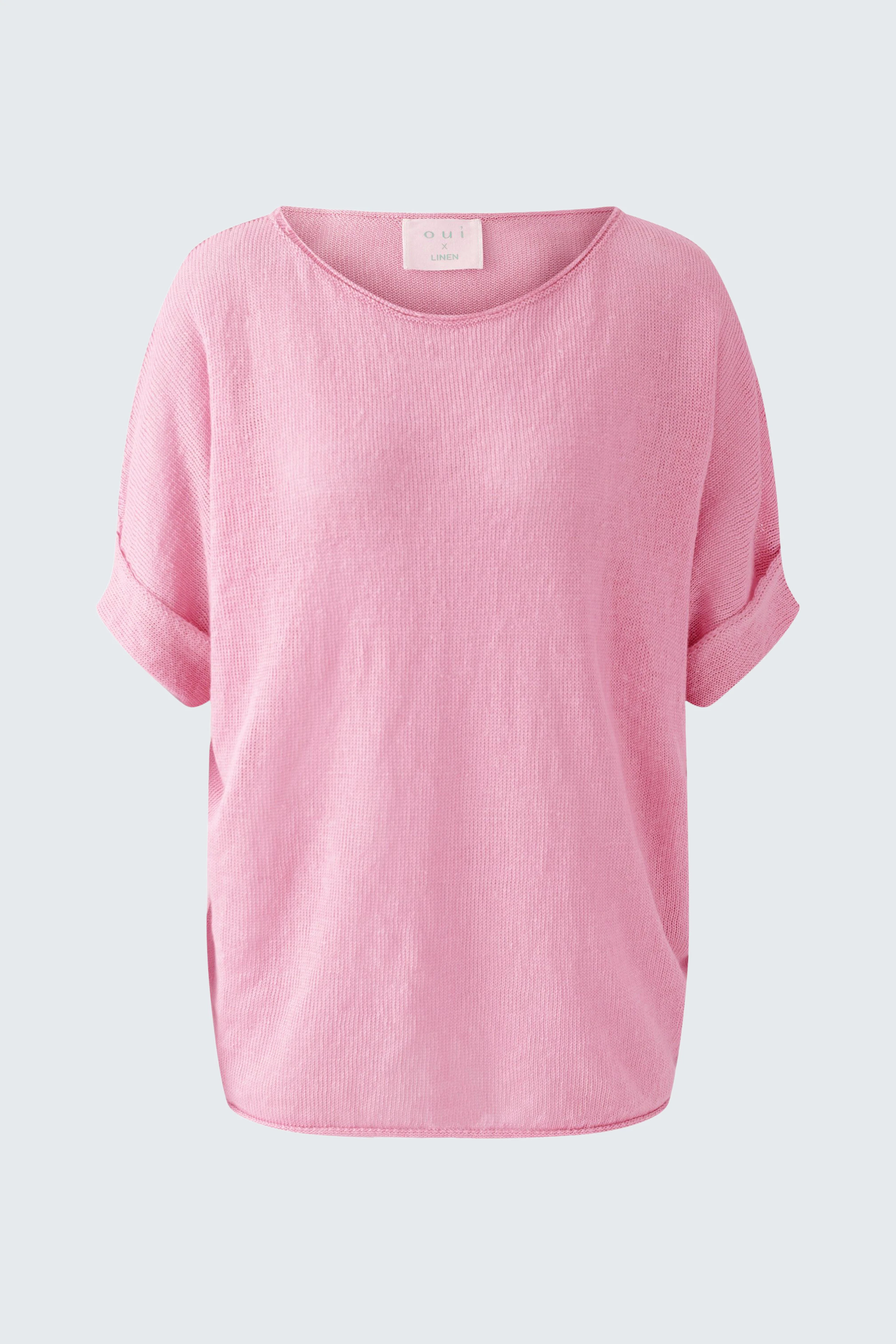 Casual women's pullover in soft pink with rolled sleeves, perfect for relaxed outfits.
