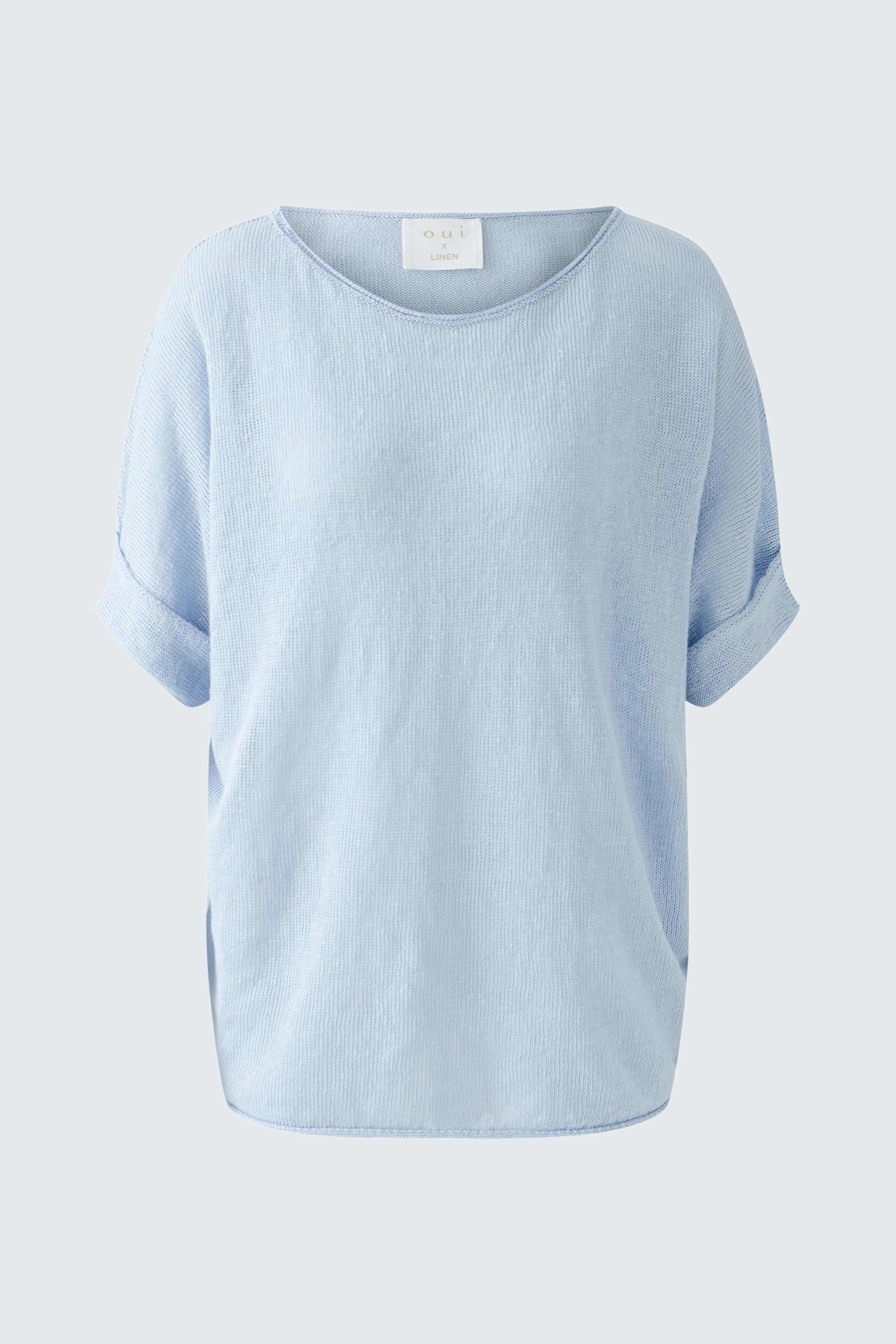 Casual women's pullover in light blue with rolled sleeves, perfect for everyday wear.