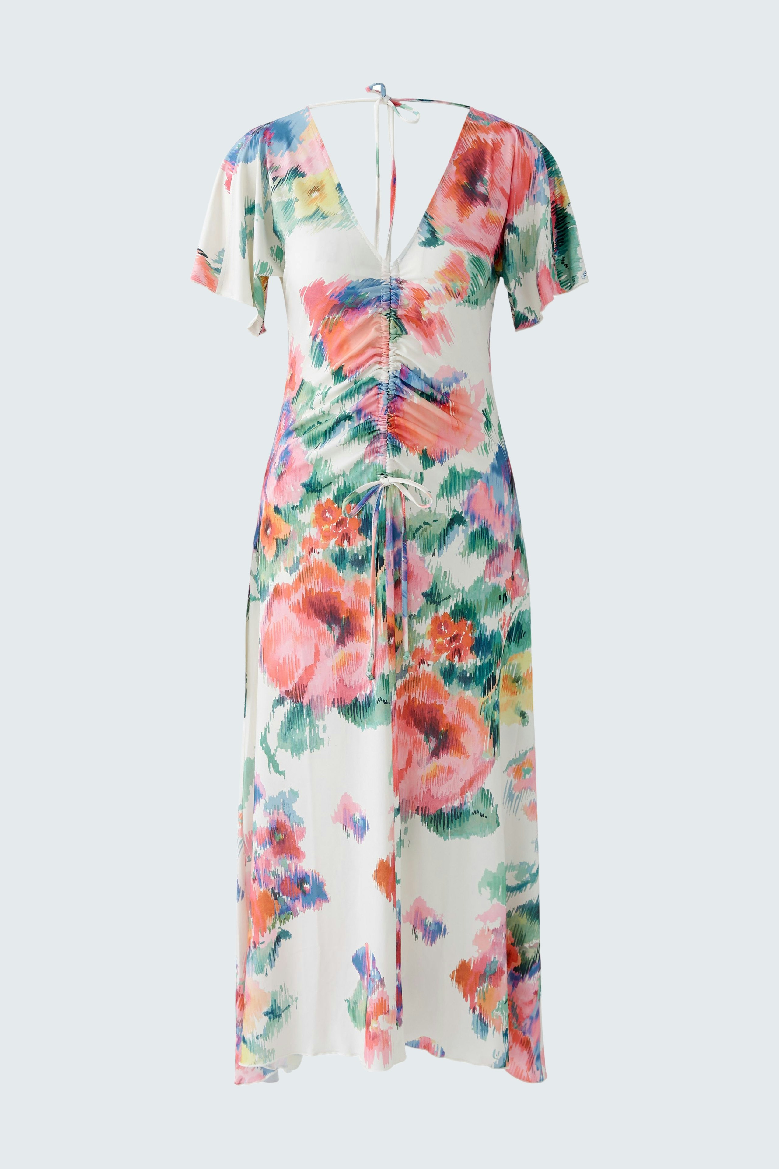 Blumiges Damen-Kleid mit V-Ausschnitt und fließendem Schnitt, ideal für warme Tage.