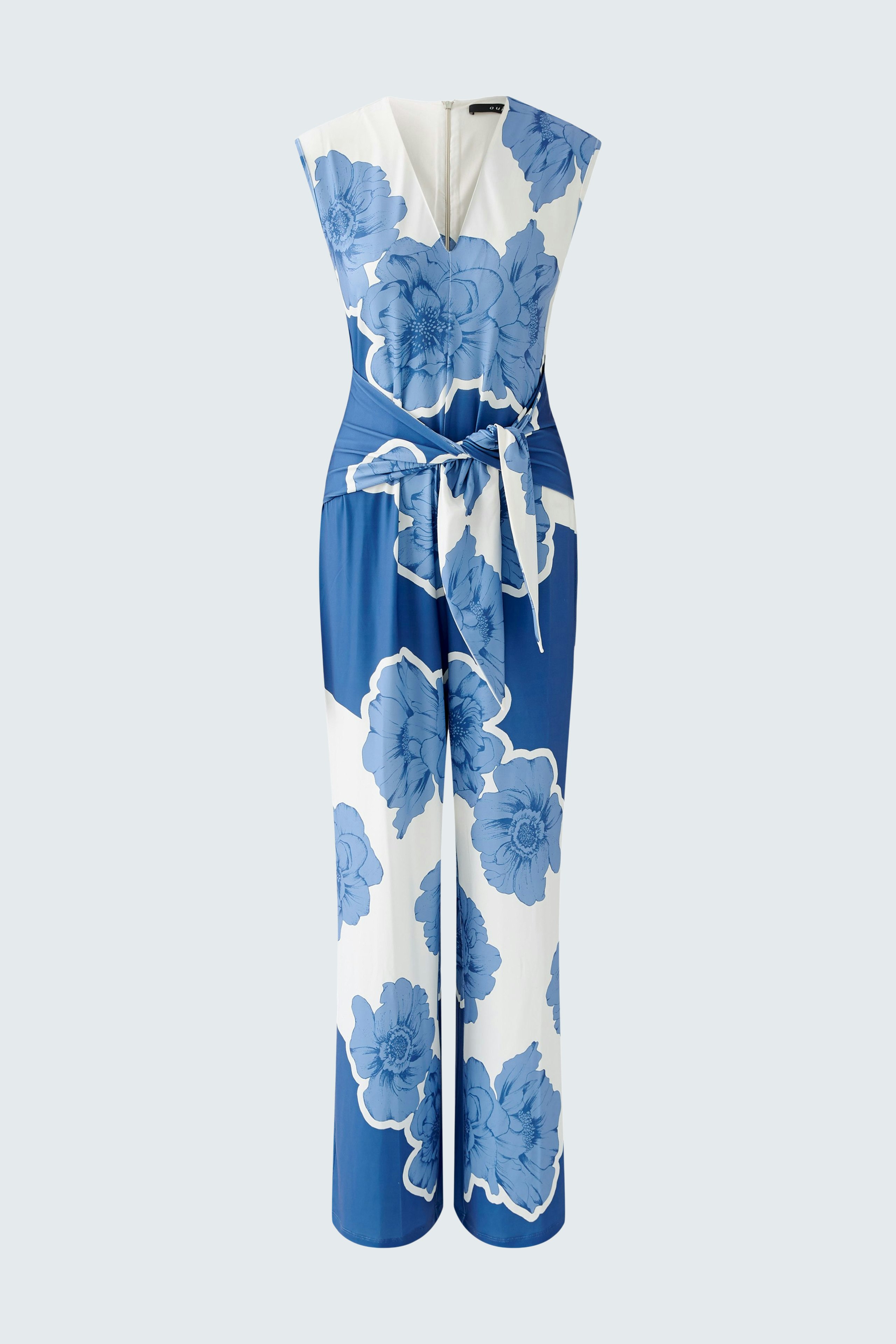 Stylish women's jumpsuit in blue floral print, featuring a flattering silhouette and a tied waist.