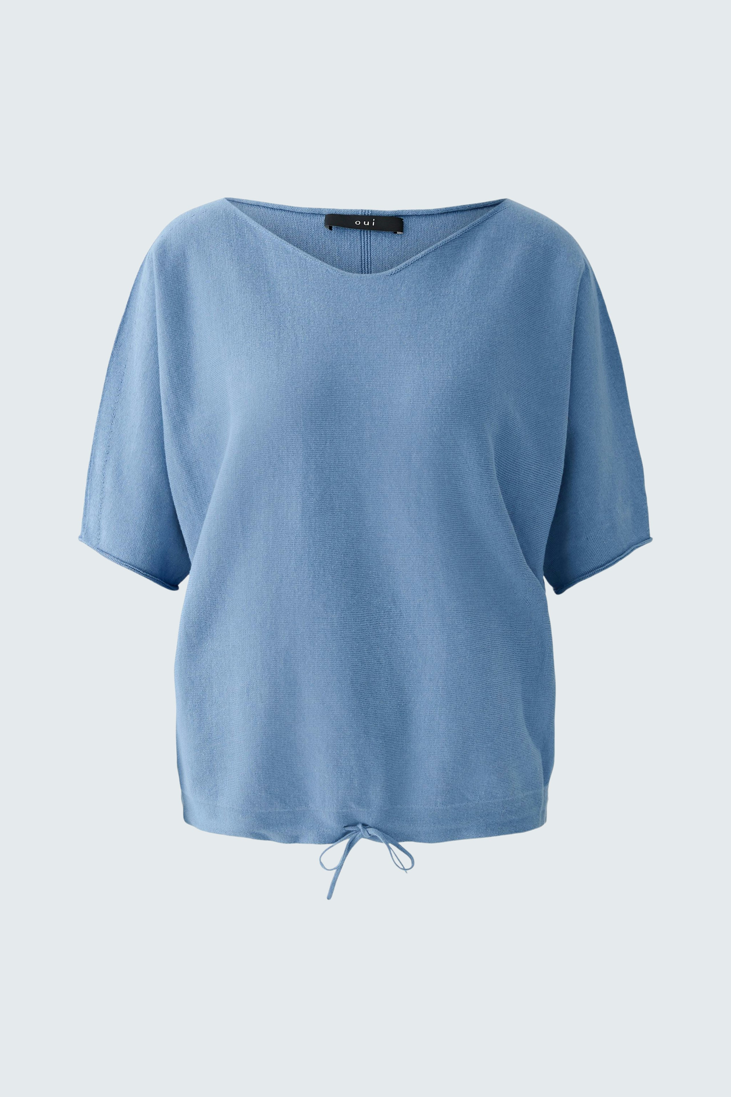Casual women's pullover: Light blue top with a relaxed fit and tie detail at the hem.
