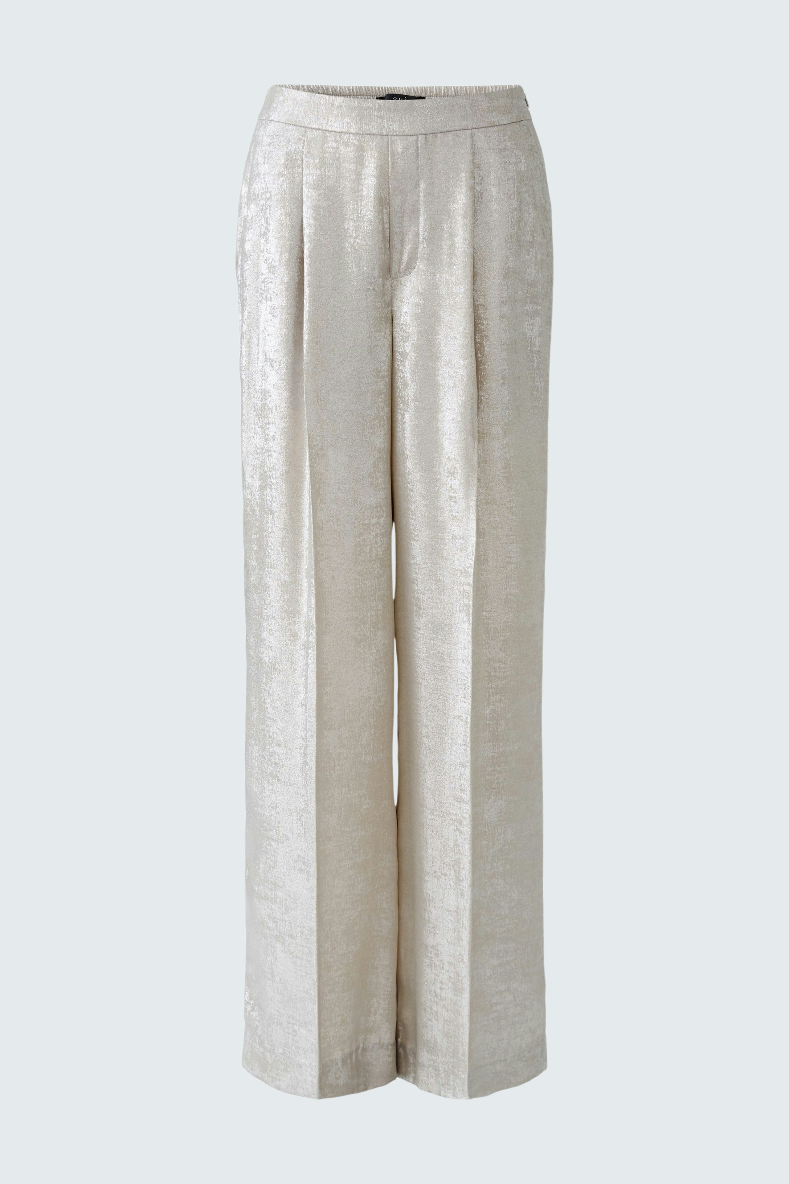 Light-colored Marlene trousers with a wide leg design, showcasing a relaxed fit.