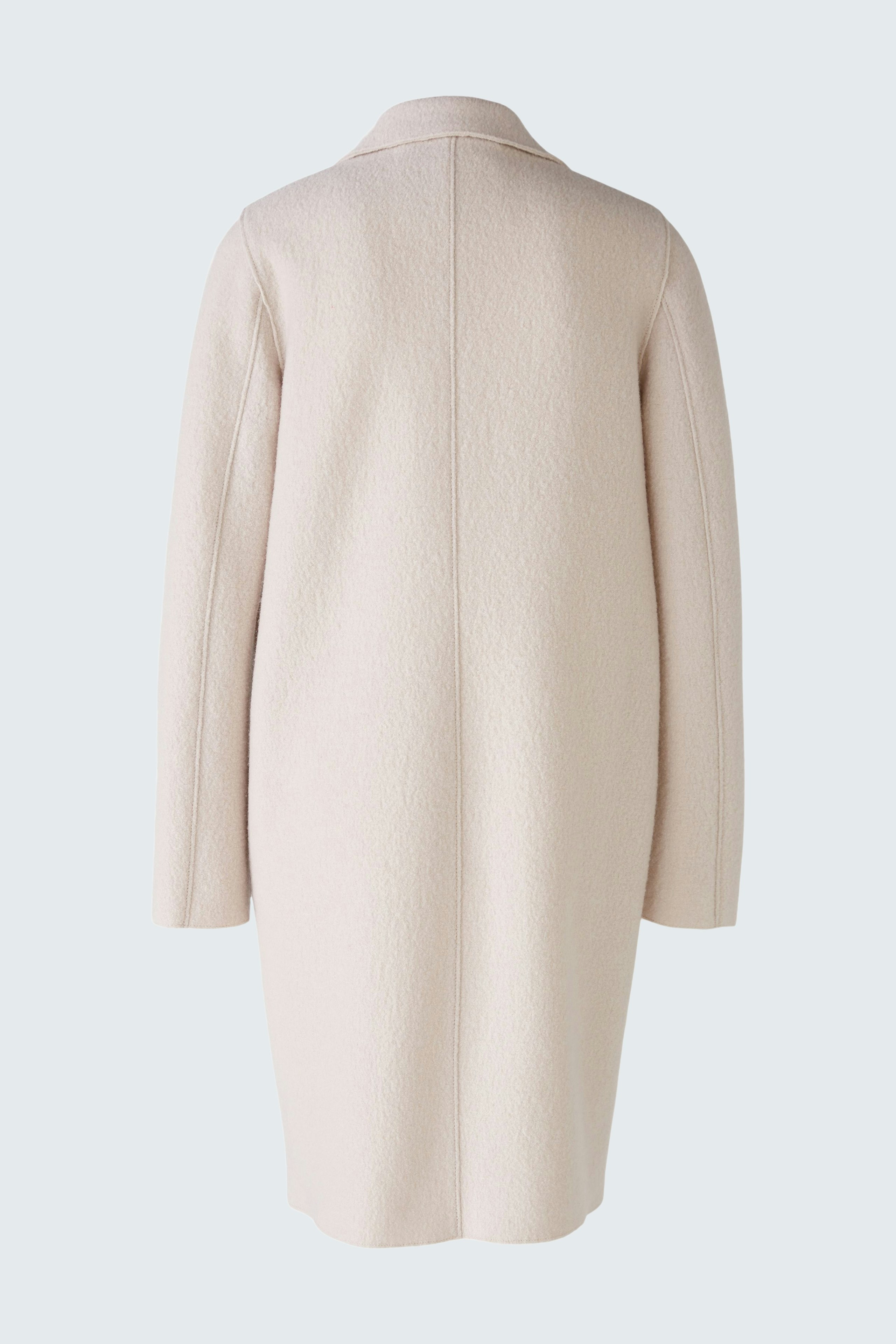 Stylish women's wool coat in soft beige, featuring a relaxed fit and minimalistic design.