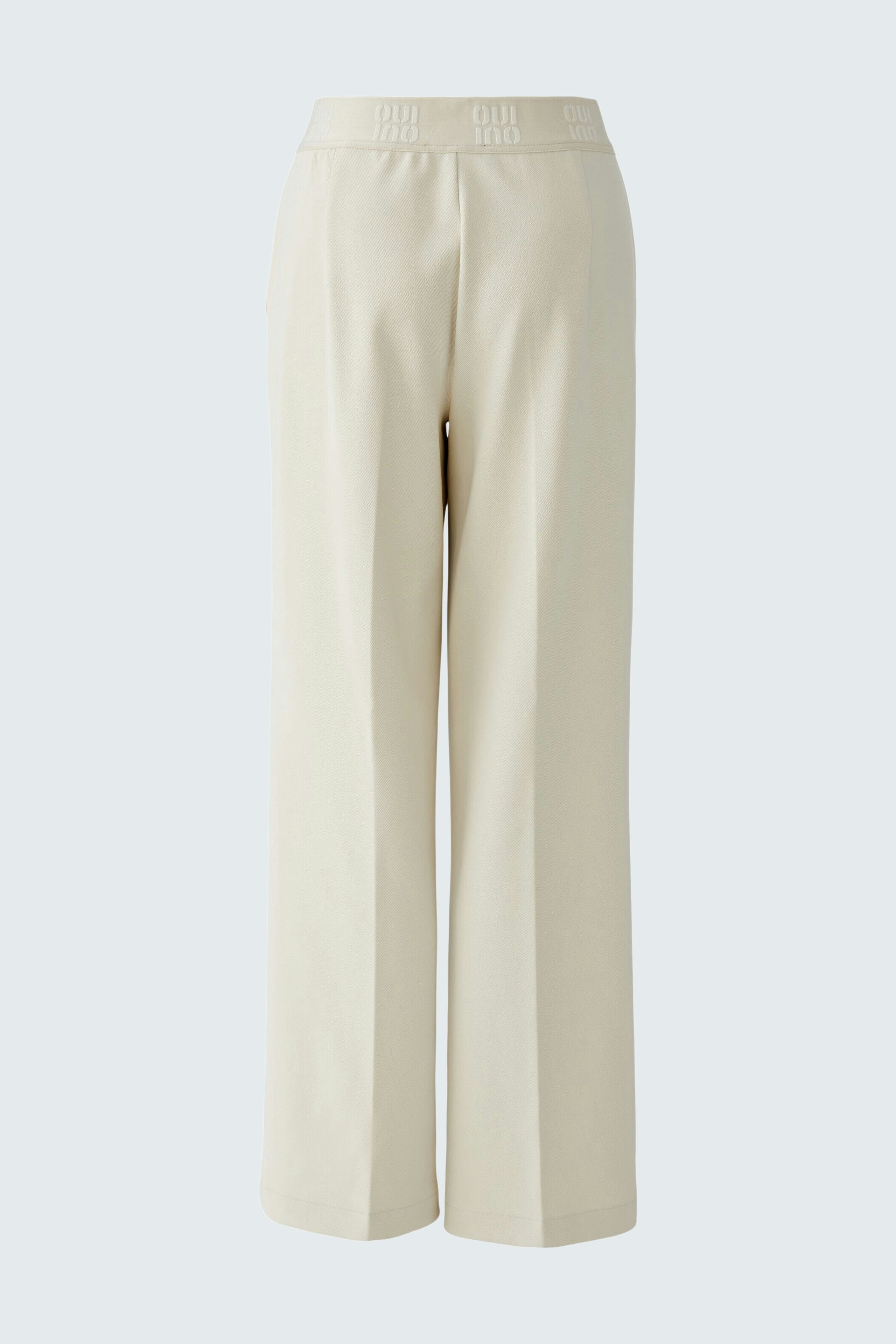 Light beige culottes with a relaxed fit, featuring a comfortable waistband.