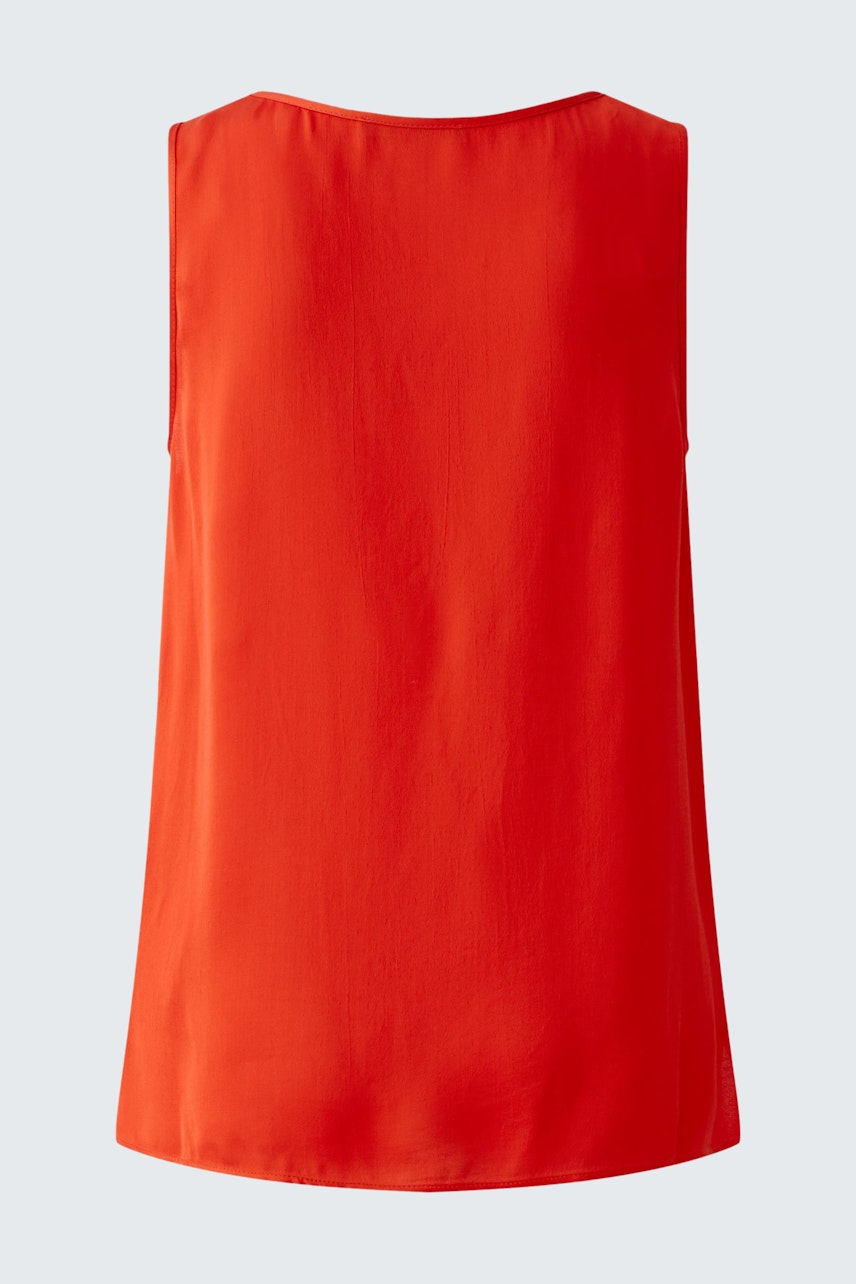 Casual women's top: Back view of a vibrant red sleeveless top, perfect for warm days.