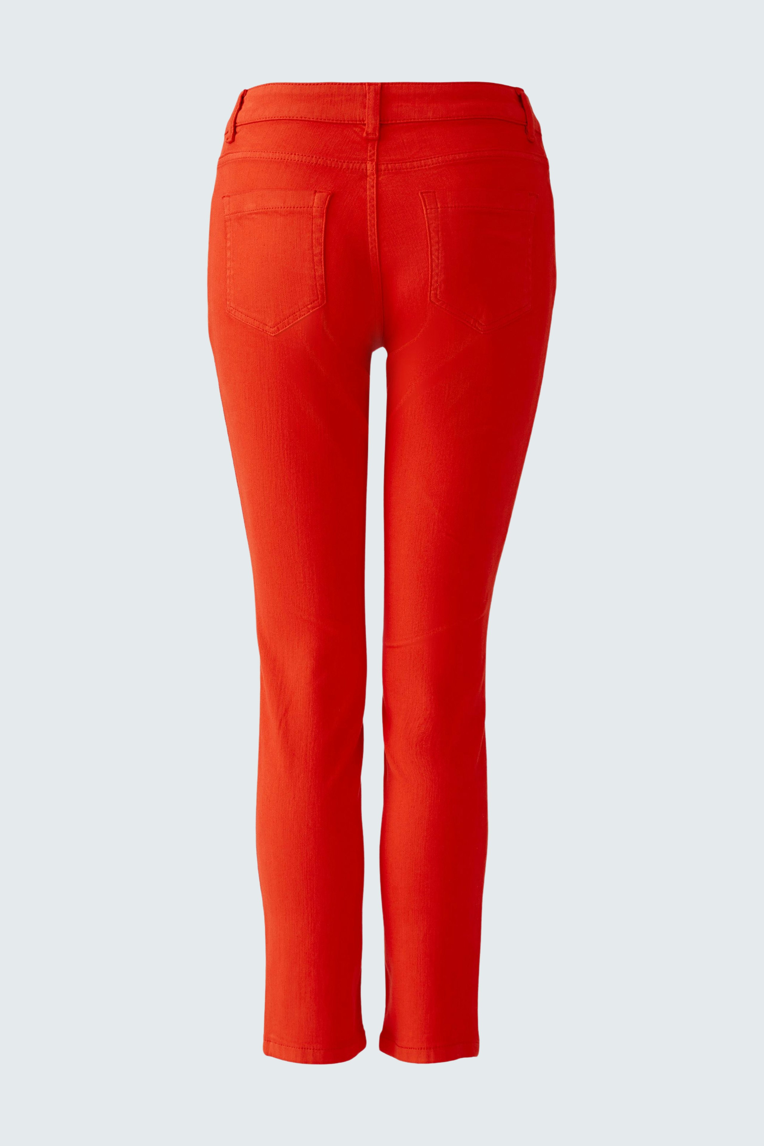 Casual women's red pants: Back view showcasing a fitted design with pockets.