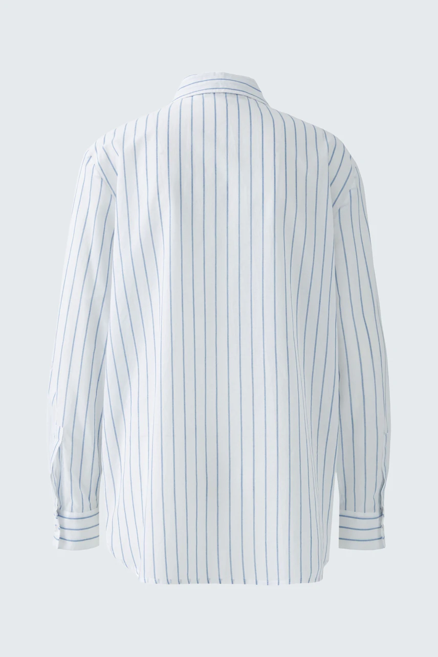 Casual women's blouse: Back view of a light blue striped blouse with a relaxed fit.