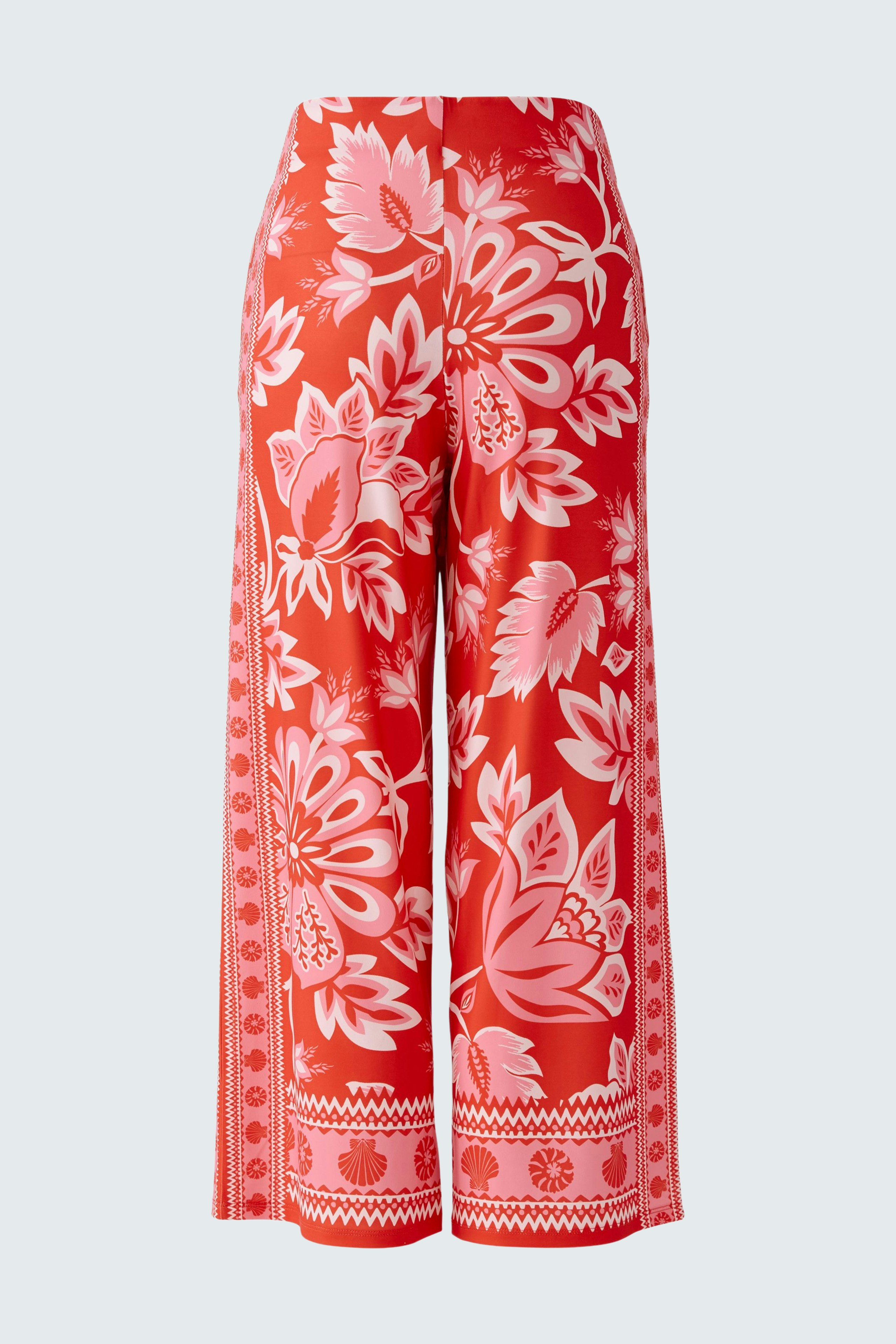 Vibrant women's pants with a floral pattern, featuring a wide-leg design and a comfortable fit.