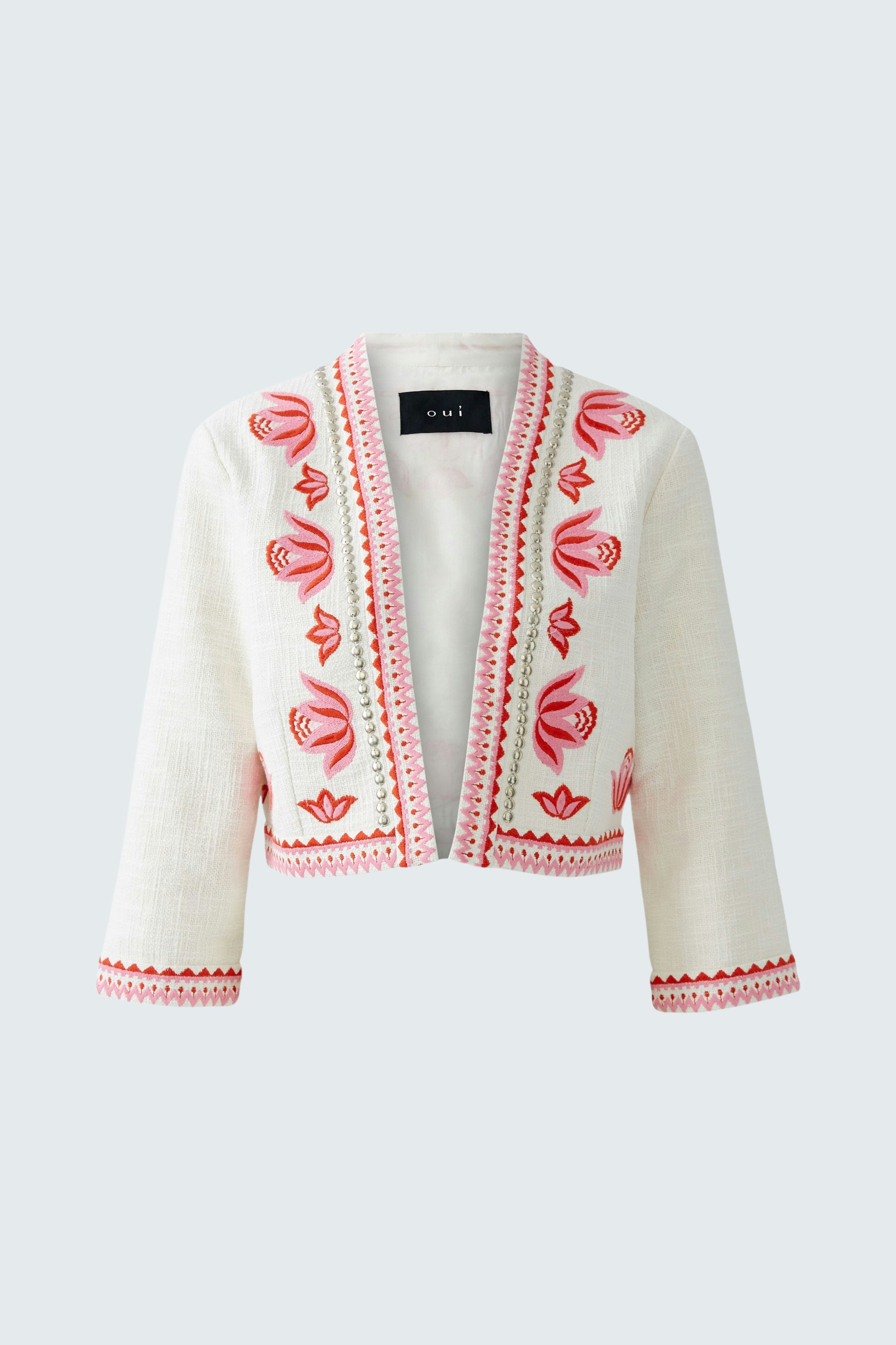Casual women's jacket: White cropped jacket with colorful floral embroidery, perfect for layering.
