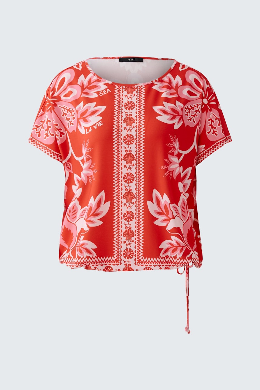Damen-T-Shirt in leuchtendem Rot mit floralem Muster und lässigem Schnitt, ideal für den Sommer.