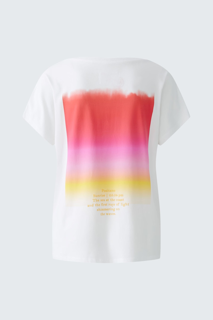 Casual women's t-shirt: White top with a colorful gradient design and motivational text on the back.