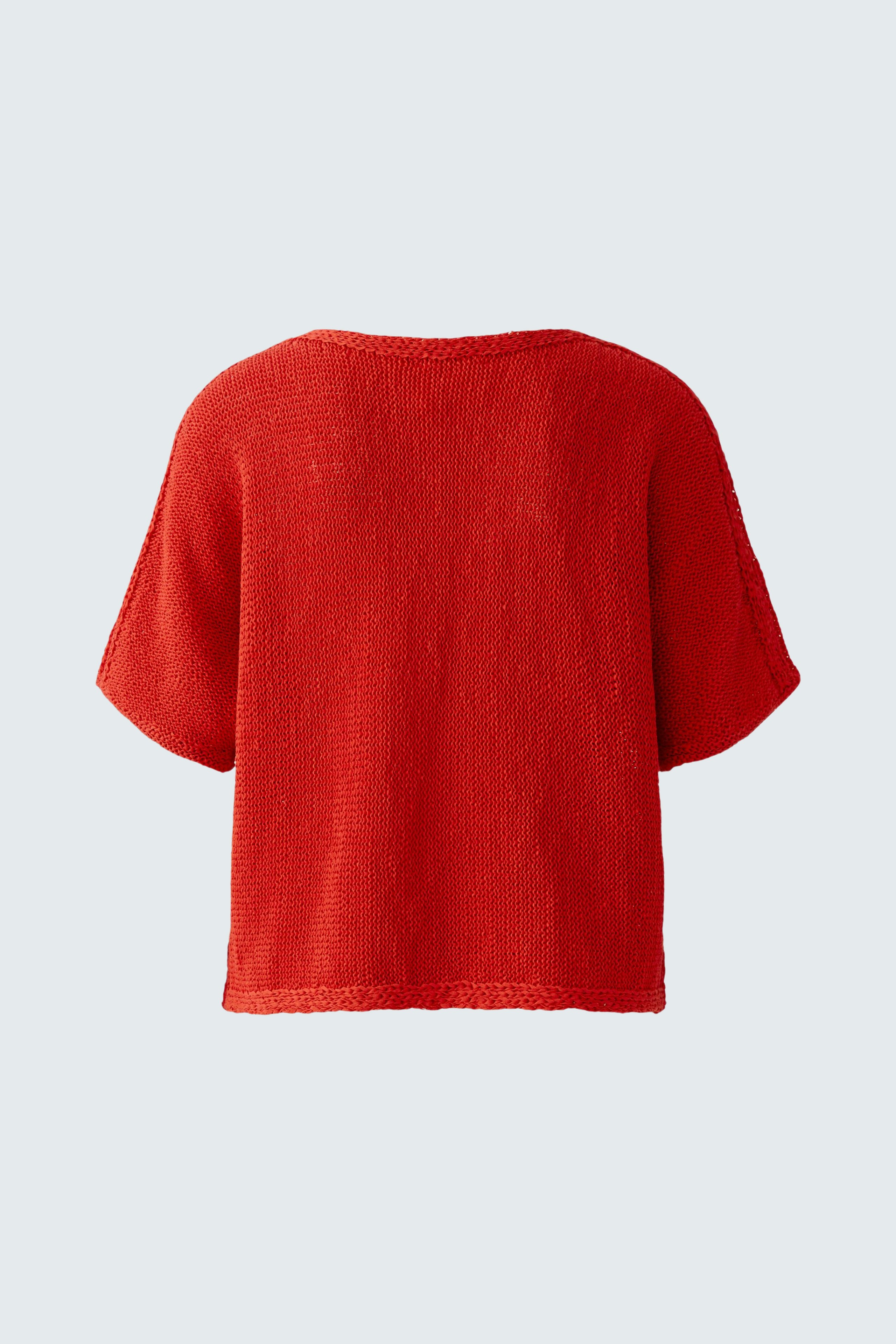 Casual women's pullover: Back view of a loose red pullover with wide sleeves.