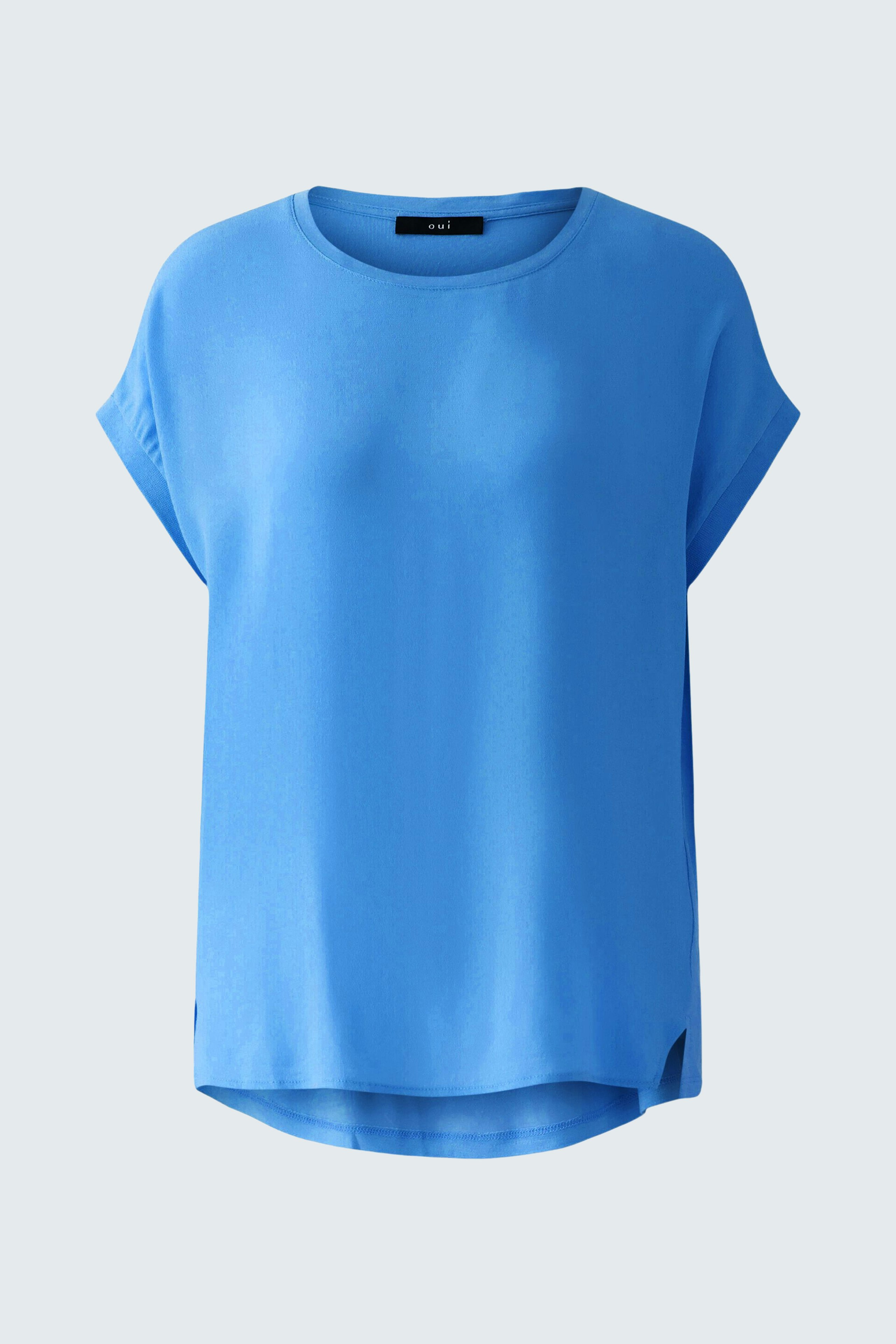 Elegant women's blouse shirt in vibrant blue, featuring a relaxed fit and soft fabric.