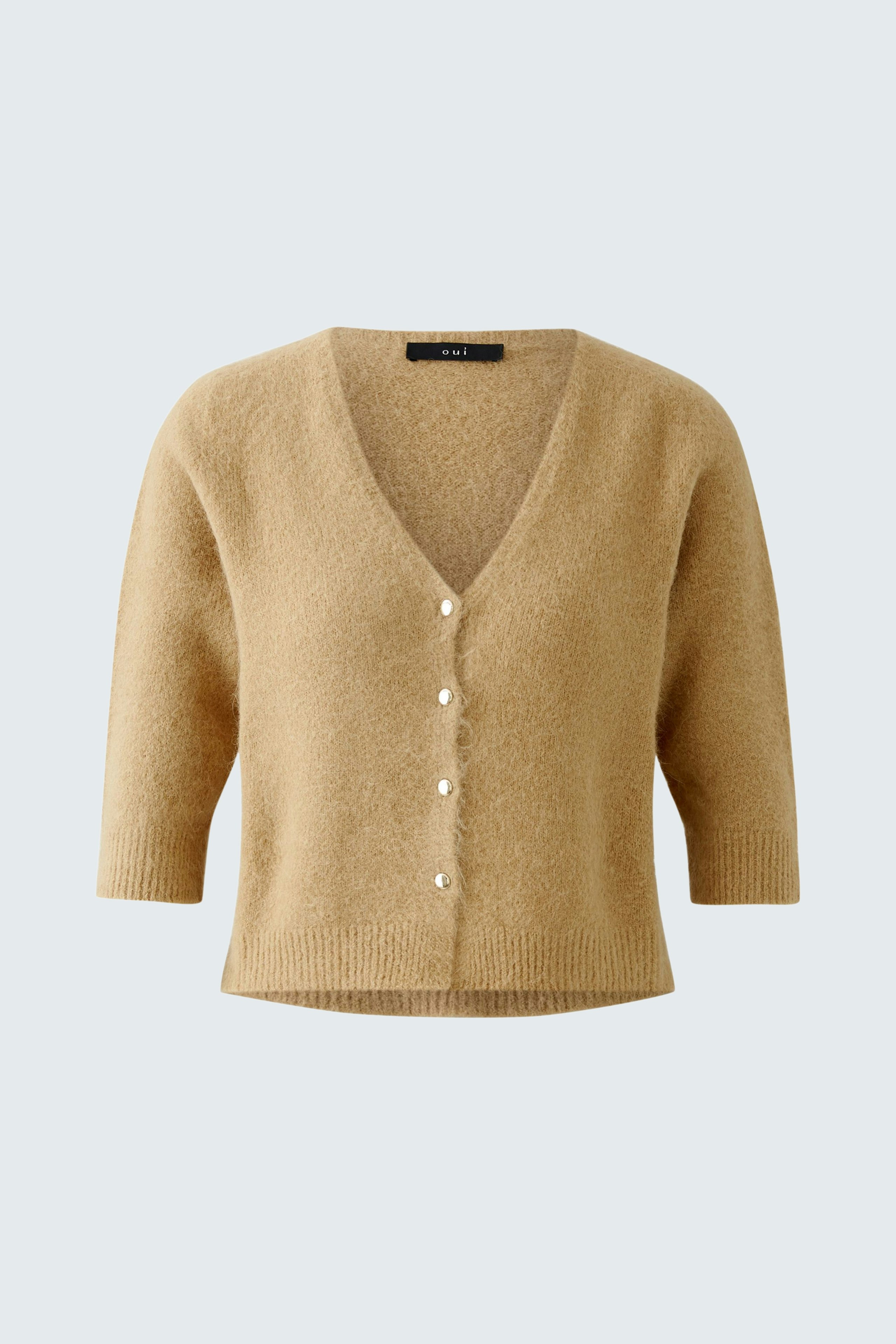 Stylish women's cardigan in soft beige with a V-neck and button closure.