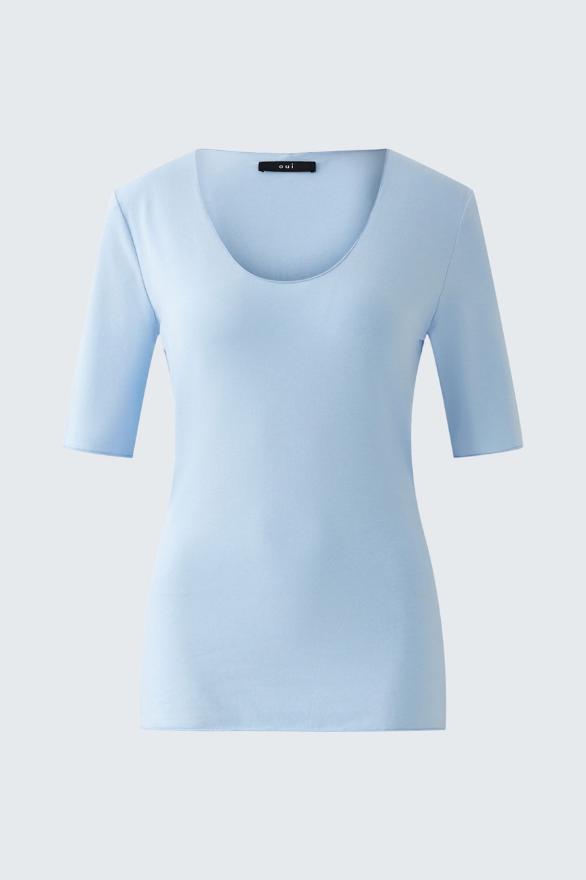 Light blue T-shirt: A fitted women's top with short sleeves and a scoop neckline.