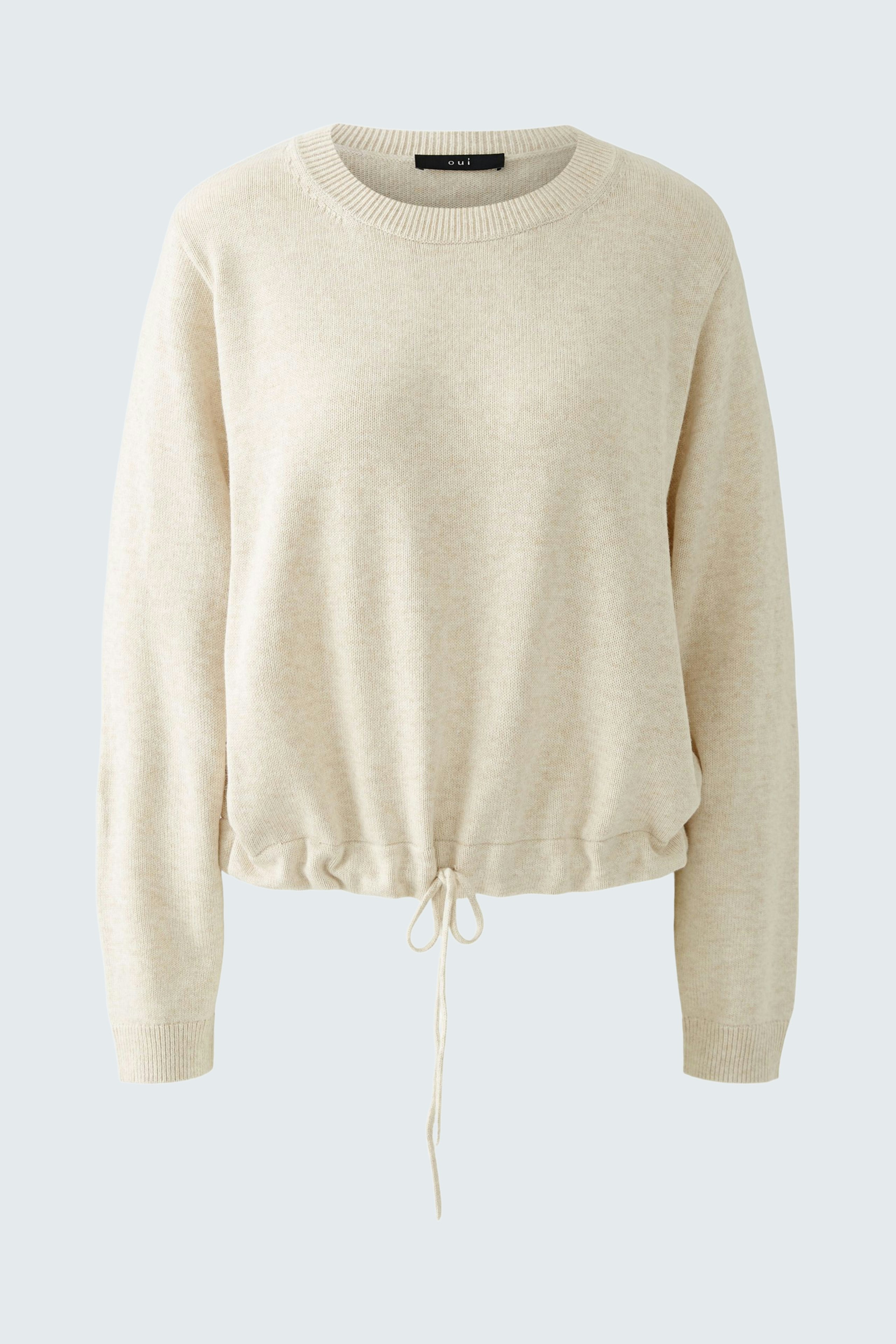 Stylish women's pullover in soft beige with a drawstring hem for a relaxed fit.