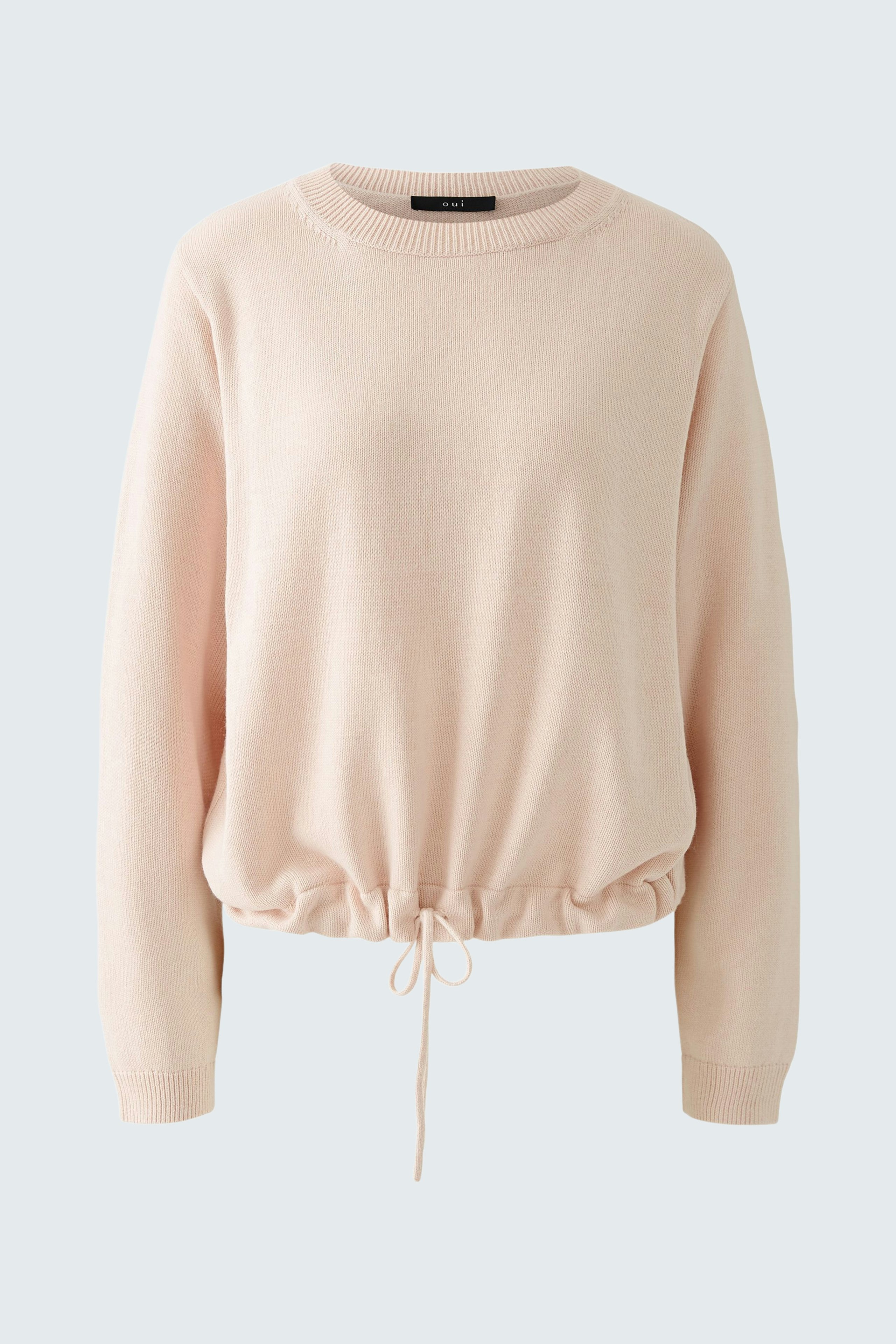 Soft pink pullover with a drawstring hem, perfect for a casual yet stylish look.