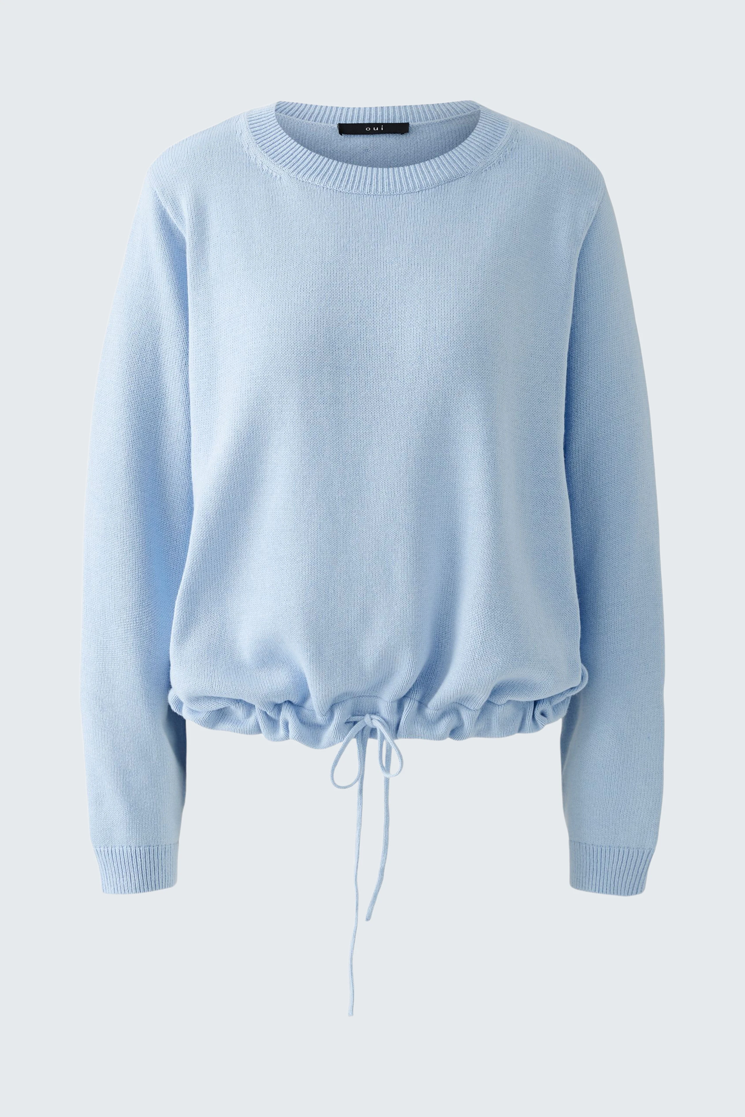 Light blue pullover with a drawstring hem, perfect for a casual yet stylish look.