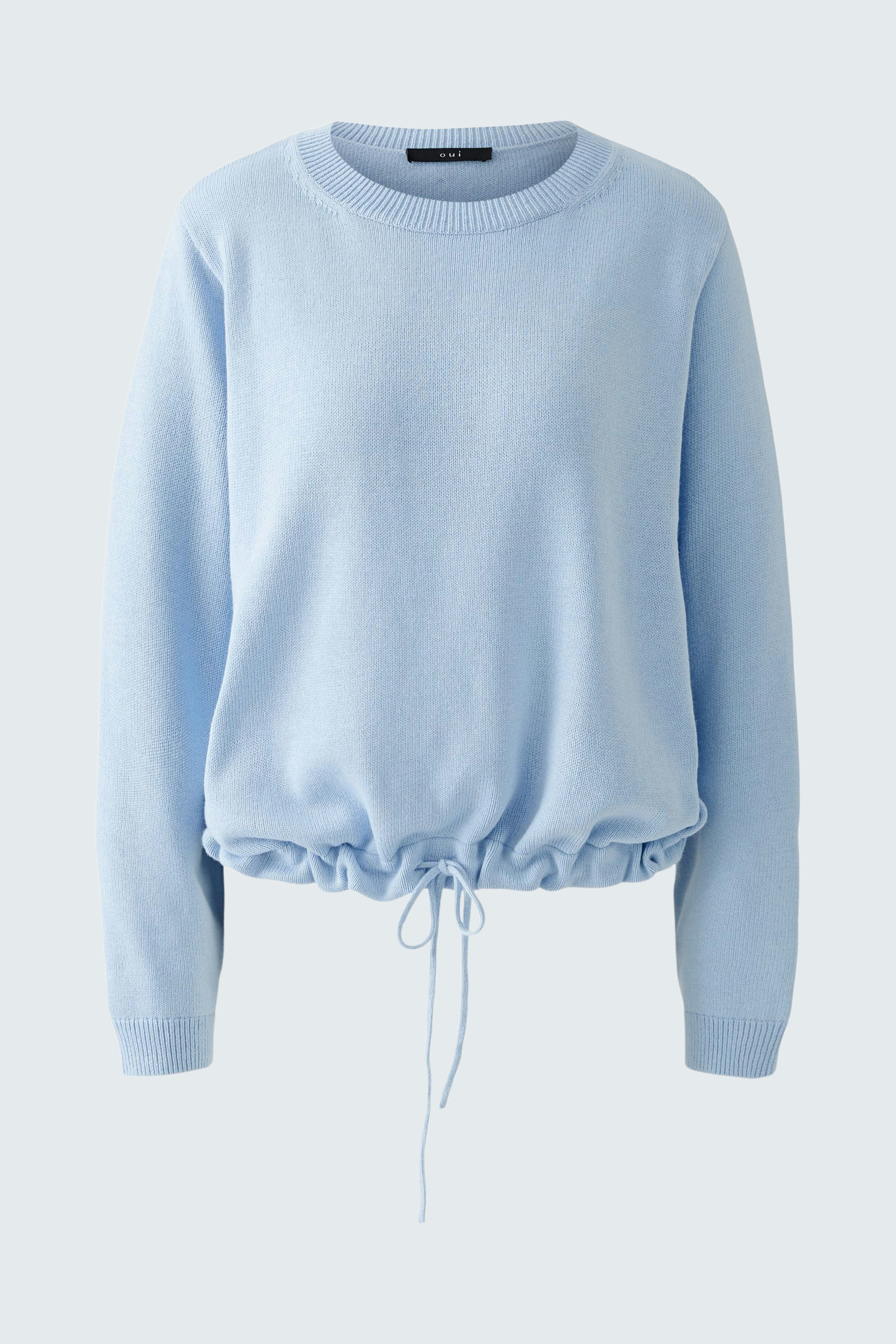 Light blue pullover with a drawstring hem, perfect for a casual yet stylish look.