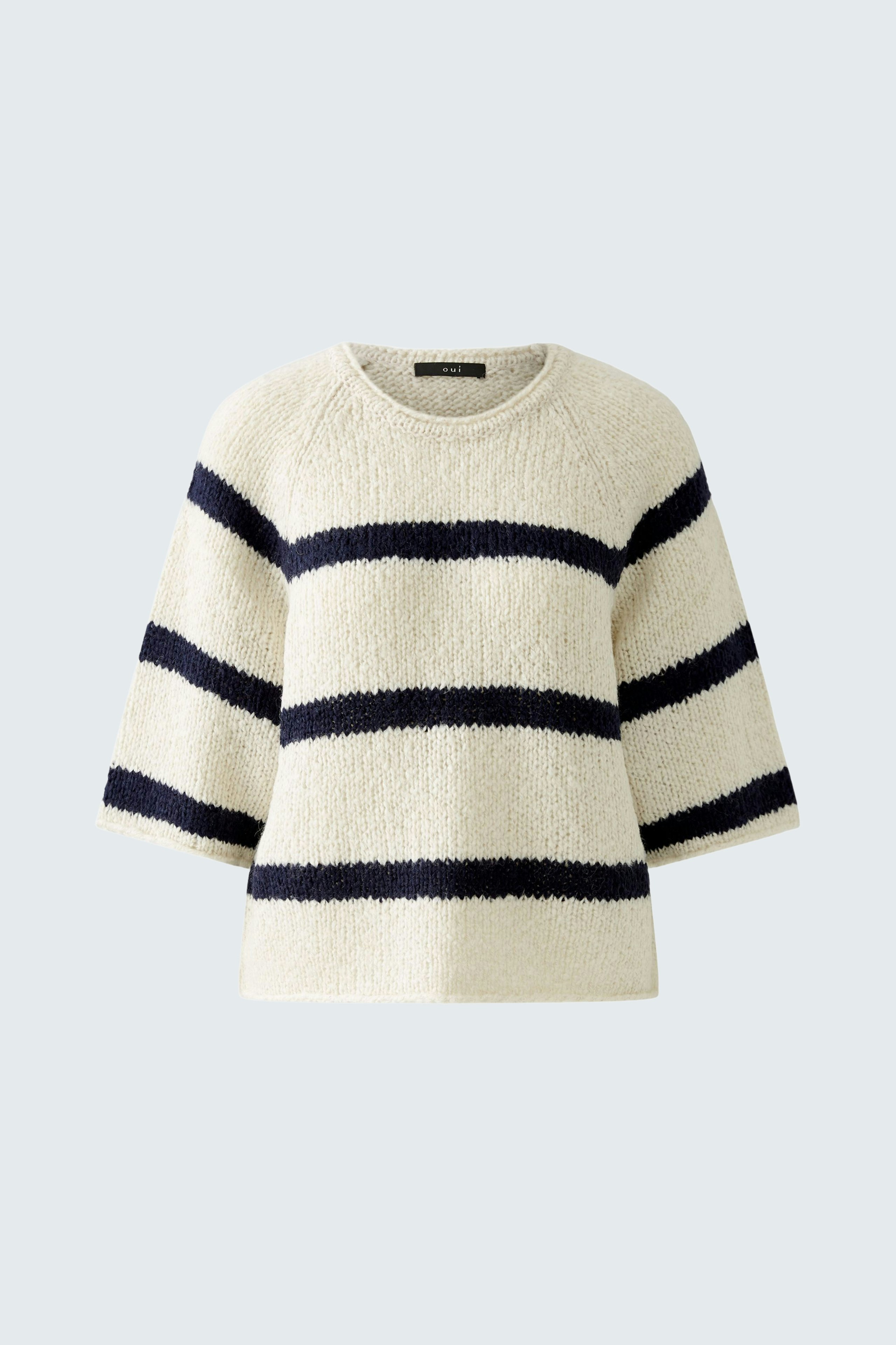Cozy women's pullover in cream with navy stripes, perfect for casual outings.