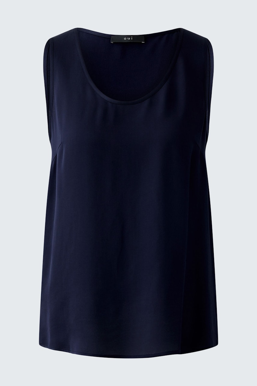 Elegant women's top in navy blue, featuring a relaxed fit and soft fabric for comfort.