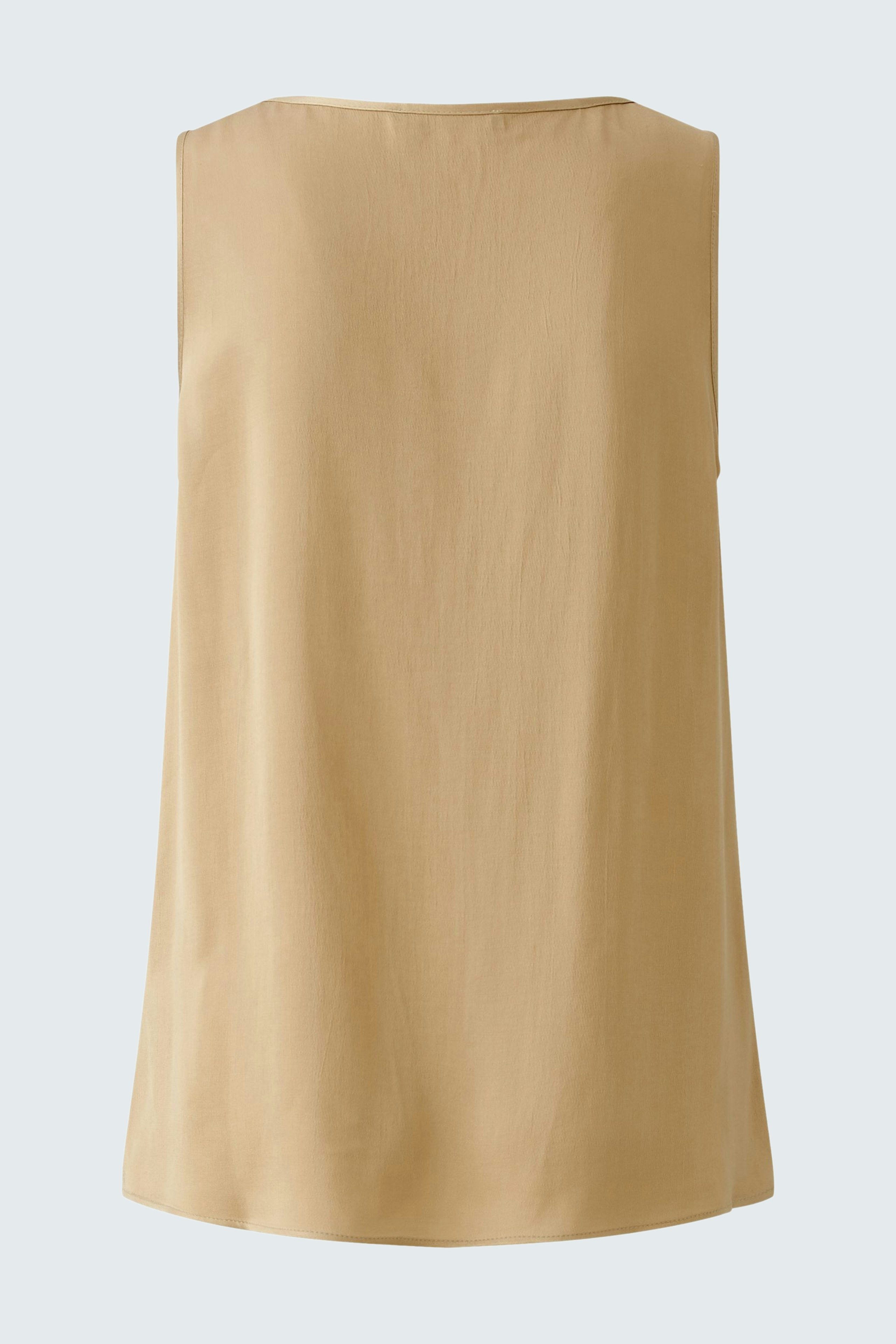 Casual women's top in a light beige color, featuring a simple sleeveless design.