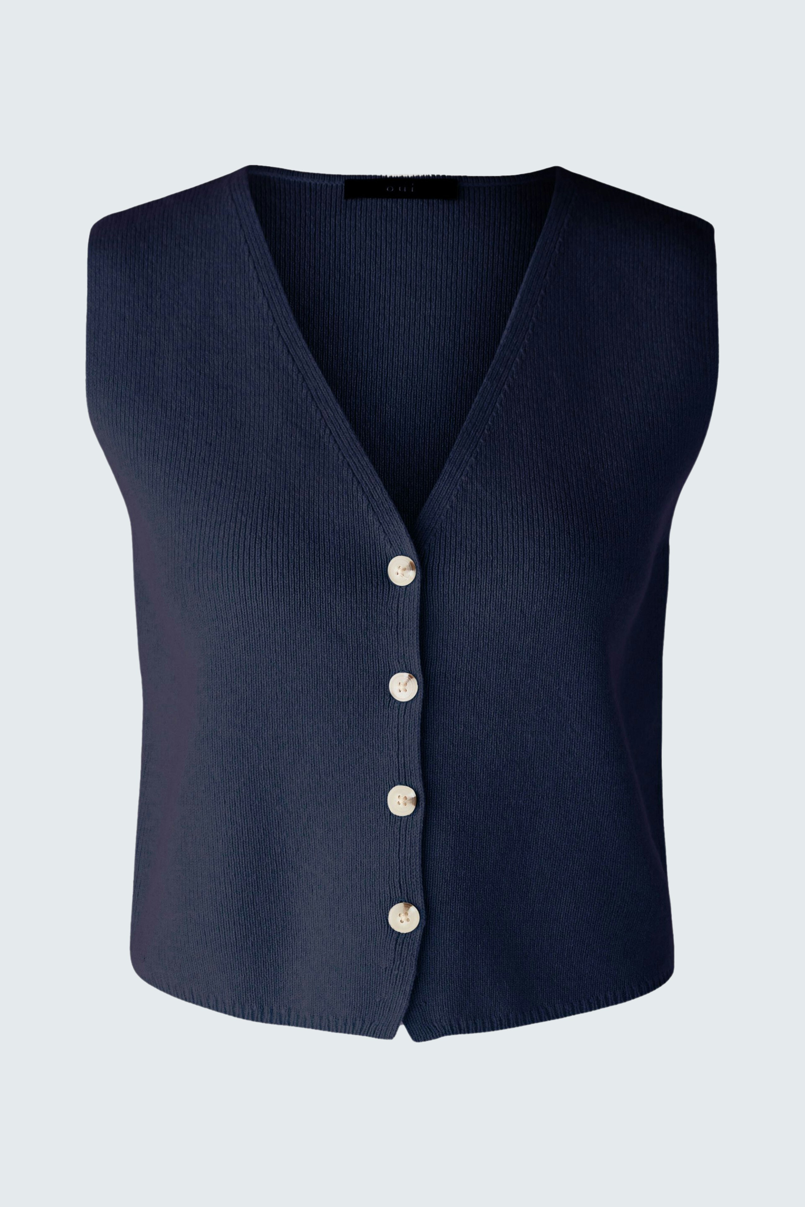 Elegant women's sleeveless pullover in navy with button details, perfect for layering.