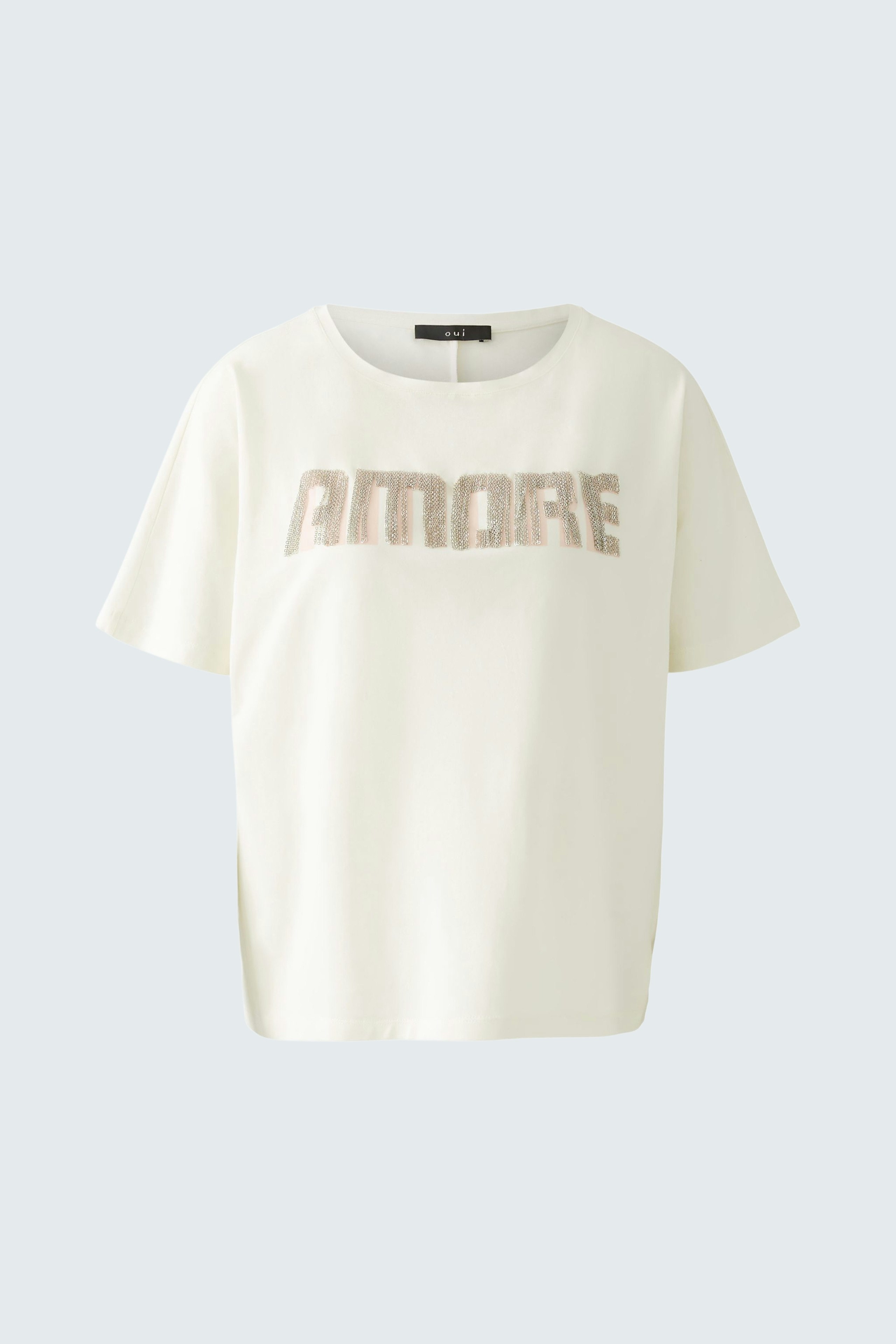 Bequemes Damen-T-Shirt in Creme mit glitzerndem Schriftzug 'AMORE' für einen lässigen Look.