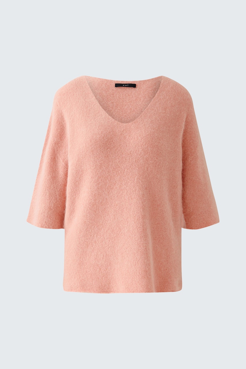 Eleganter Damen-Pullover in zartem Rosa mit V-Ausschnitt und lässigen, weiten Ärmeln.