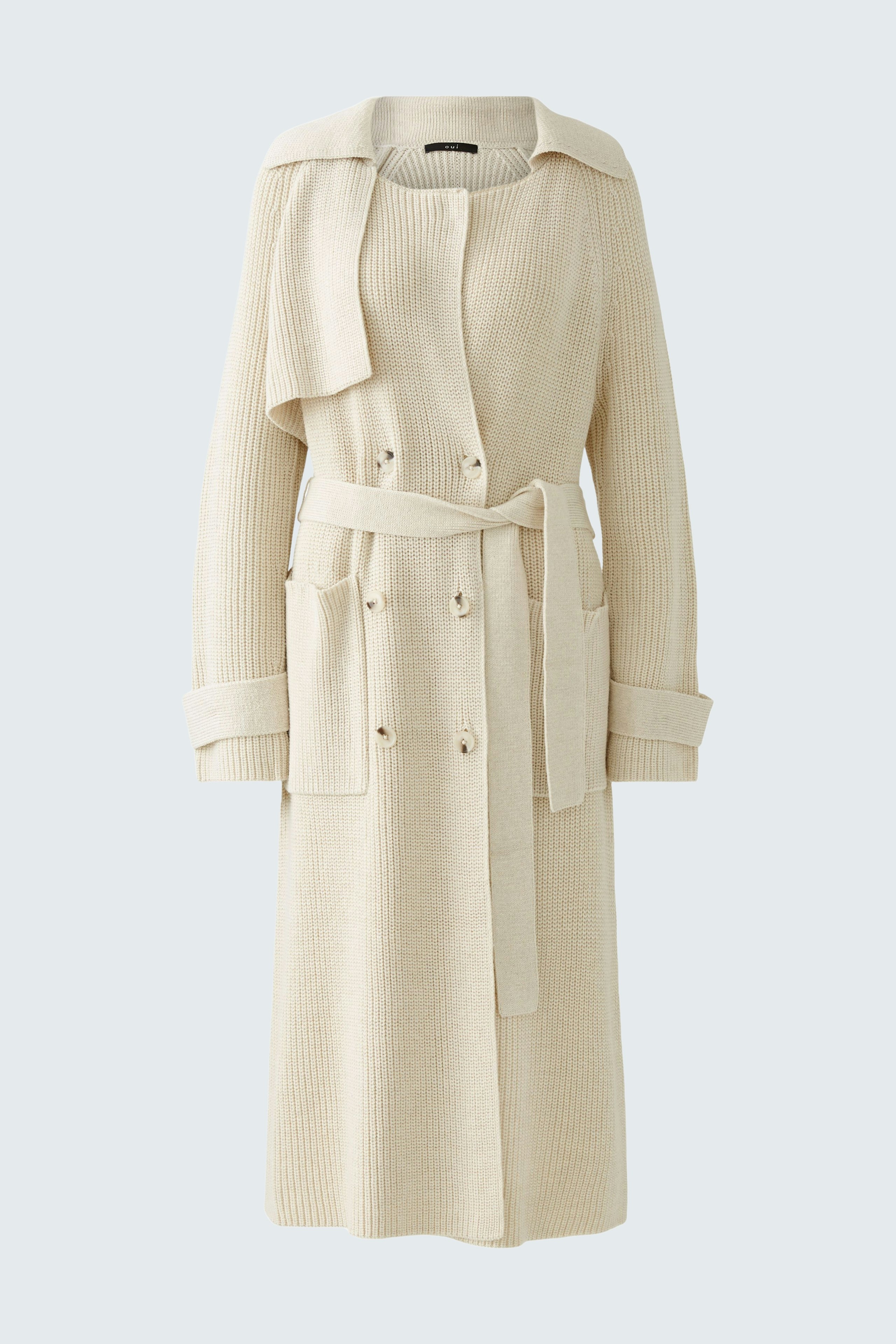Elegant women's knitted coat in soft cream color with a belted waist and stylish pockets.
