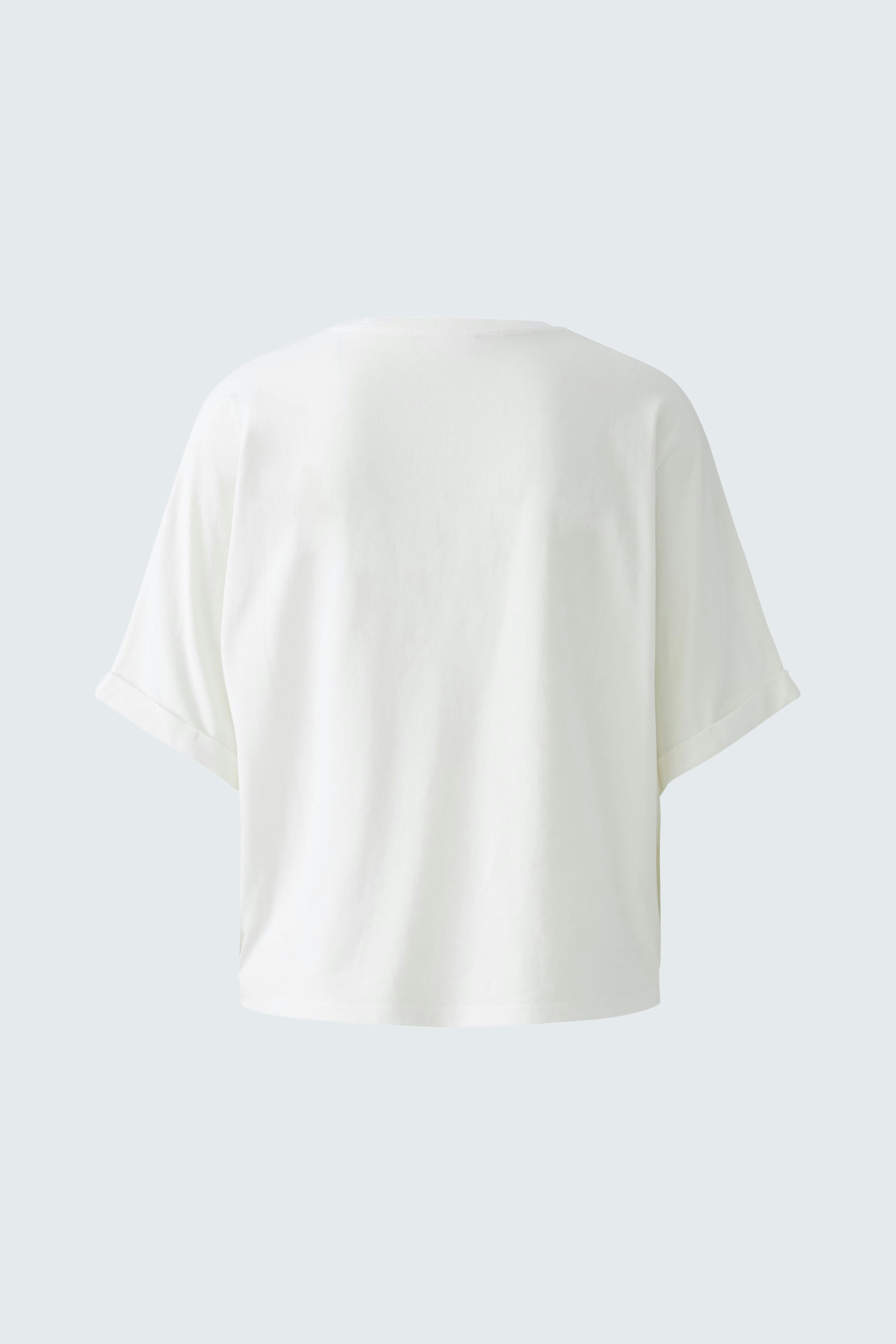 Bequeme Damen-T-Shirt: Weiße, lässige Bluse mit weitem Schnitt und kurzen Ärmeln.